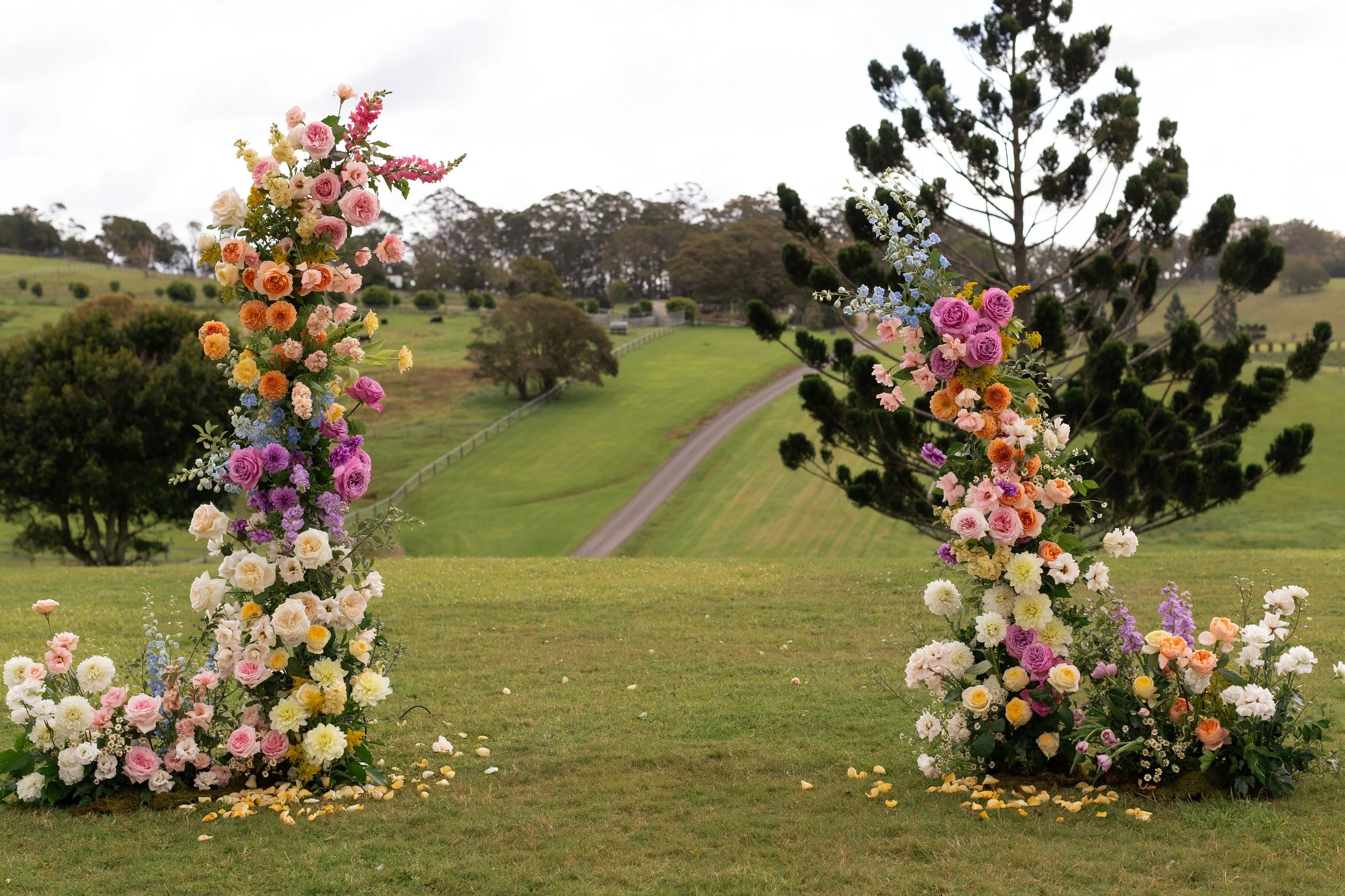 colourful wedding broken arch arbour at scenic rim wedding venue