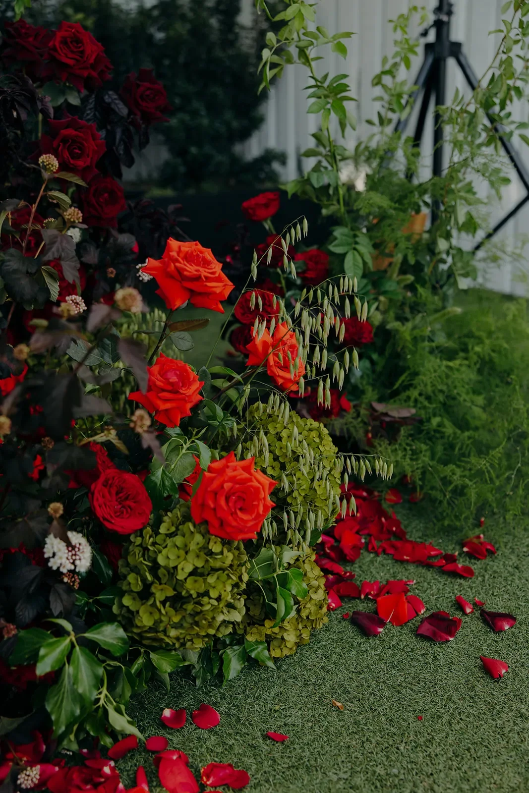romantic garden style red rose arrangements at Brisbane Wedding