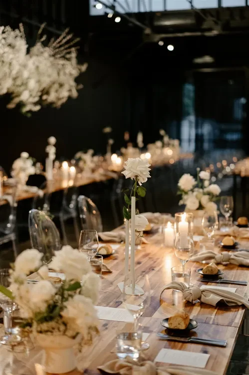 Candlelit wedding reception styling with white florals at The Refinery Brisbane