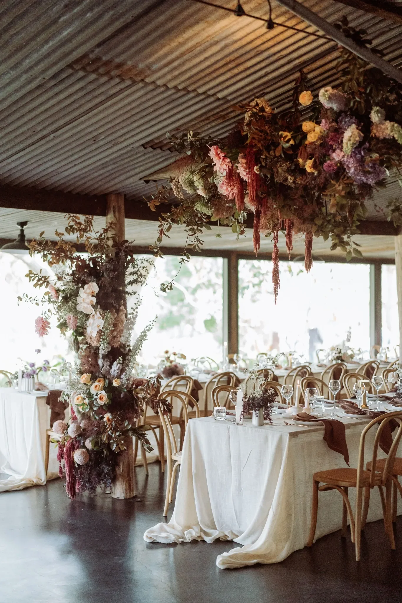 Contemporary yet rustic wedding reception florals at Bunnyconnellen Scenic Rim wedding
