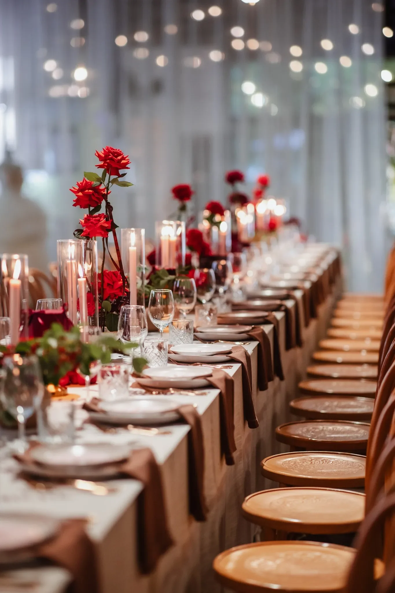 Romantic red rose tablescape with candlelight