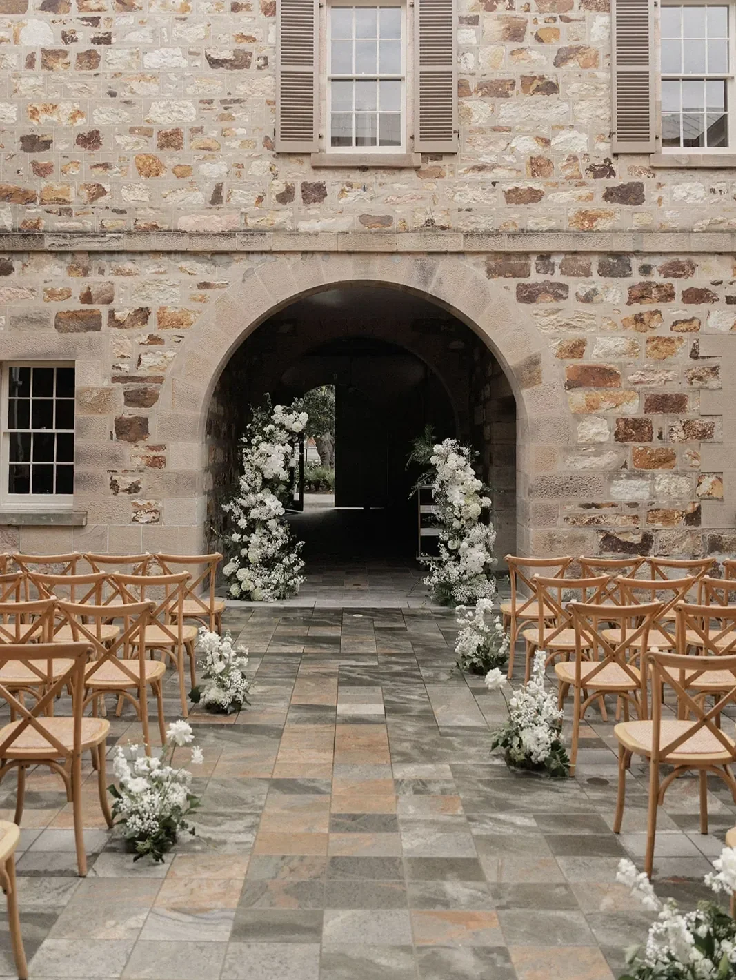 white and green wedding flowers at Old Government House in Brisbane ready for wedding ceremony