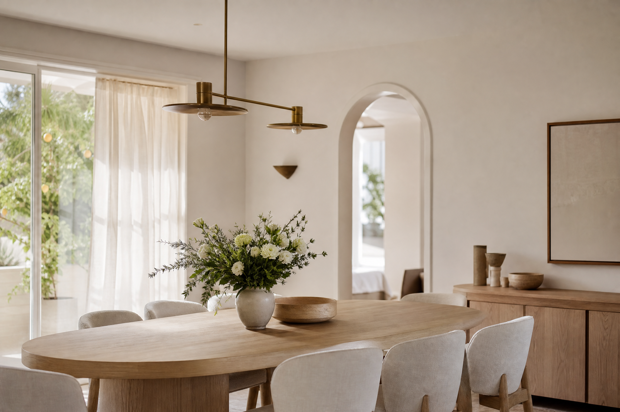 Airy dining room with white oak table and brass pendants, Tuesday Lane Woollahra