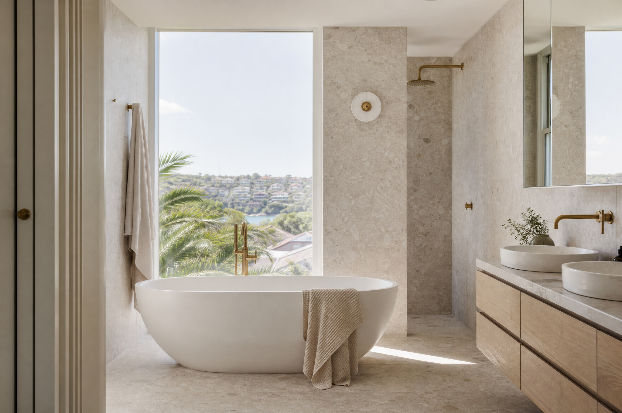 Stone and brass bathroom with freestanding bath, Tuesday Lane interior designers Coogee