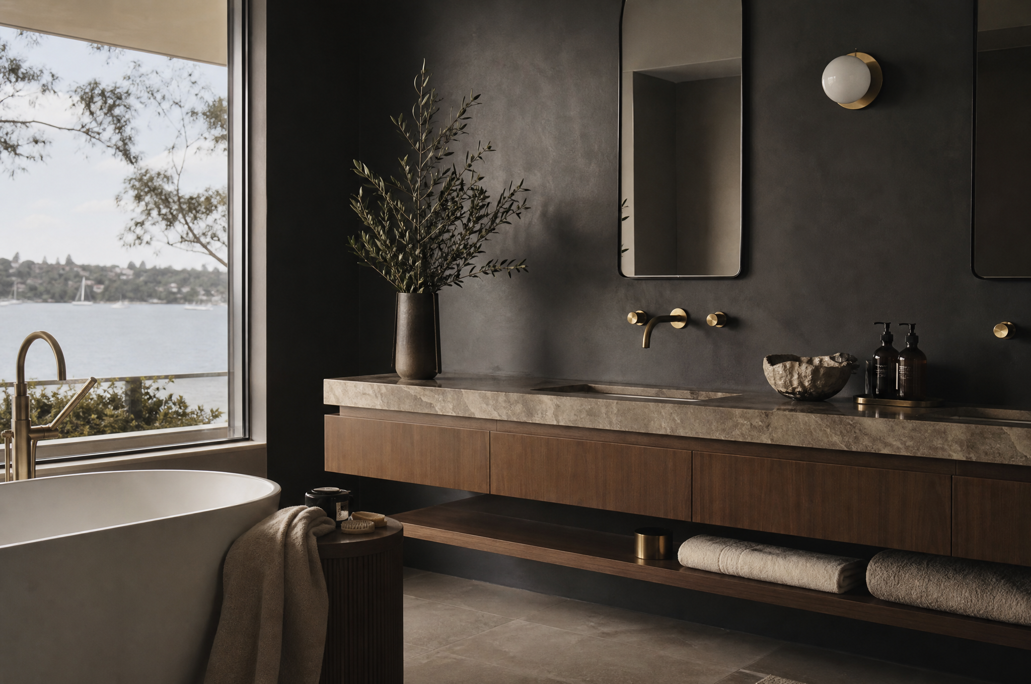Moody charcoal bathroom with freestanding bath and brass fixtures, Tuesday Lane Lower North Shore Sydney