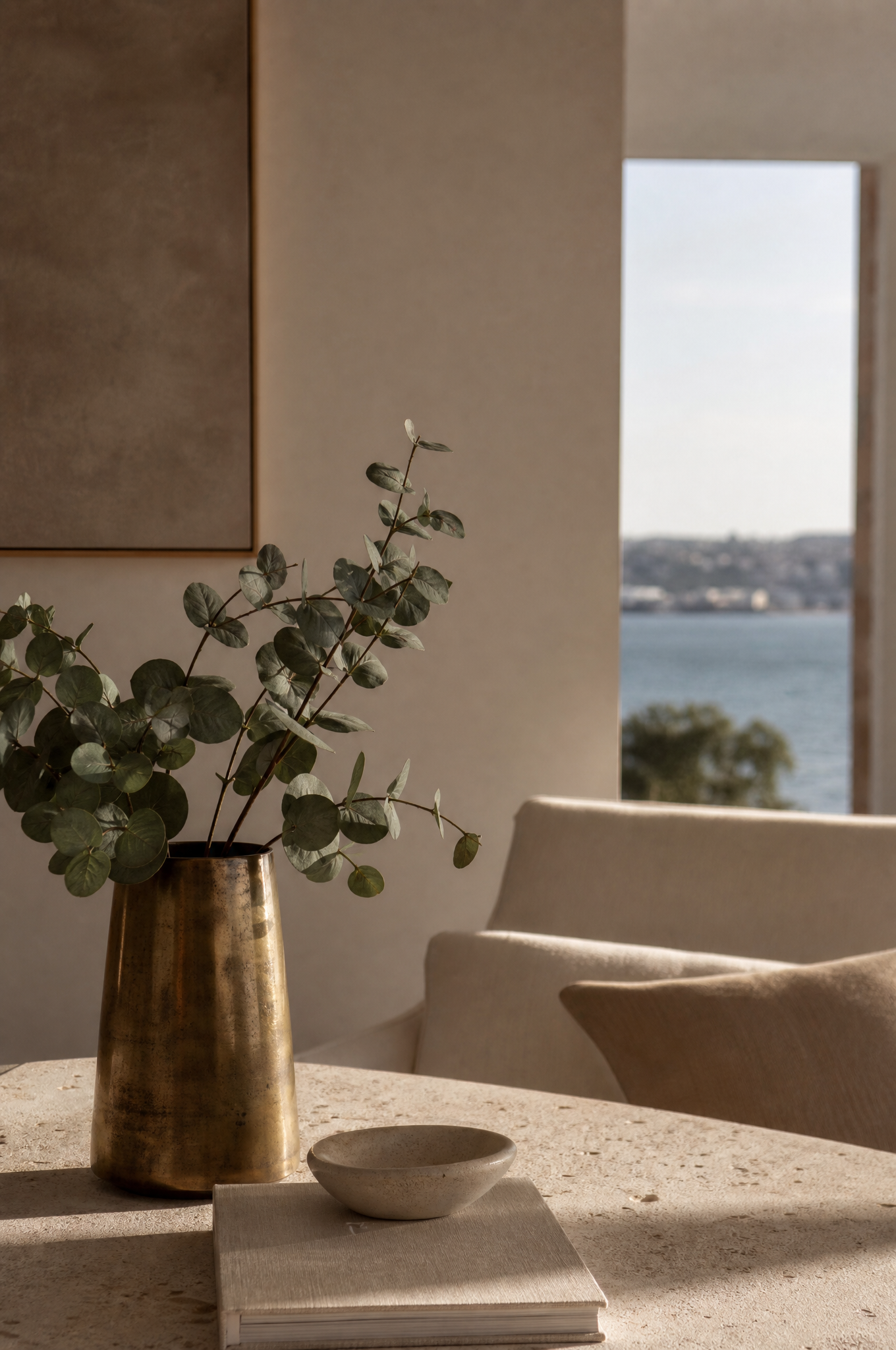 Harbourside interior styling detail with brass vase and eucalyptus, Tuesday Lane Mcmahons Point Sydney