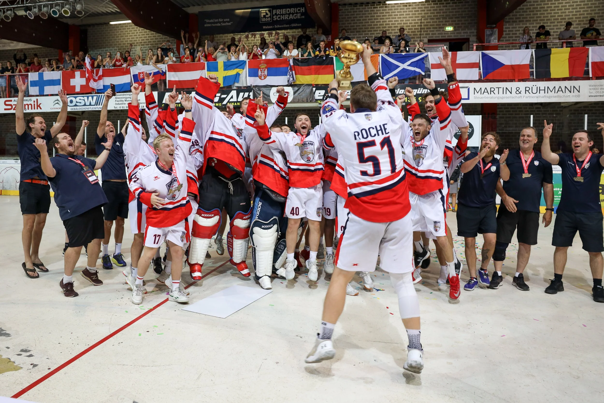 Roche and his team mates celebrate lifting the 2022 Euros trophy