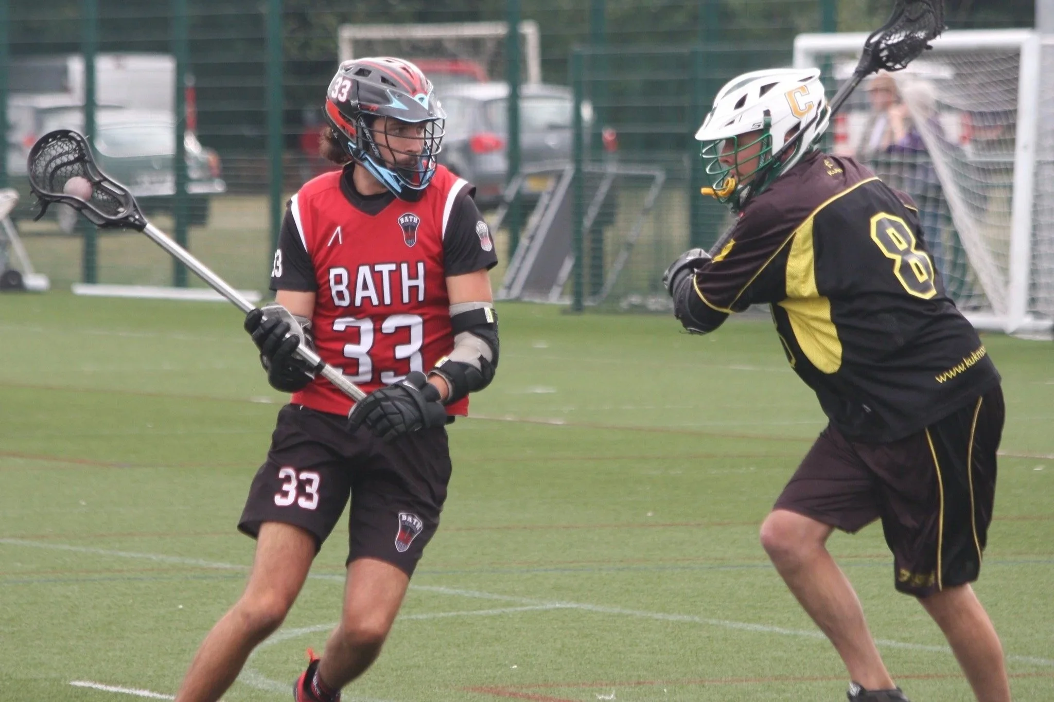 Bath player battles against Cheadle player