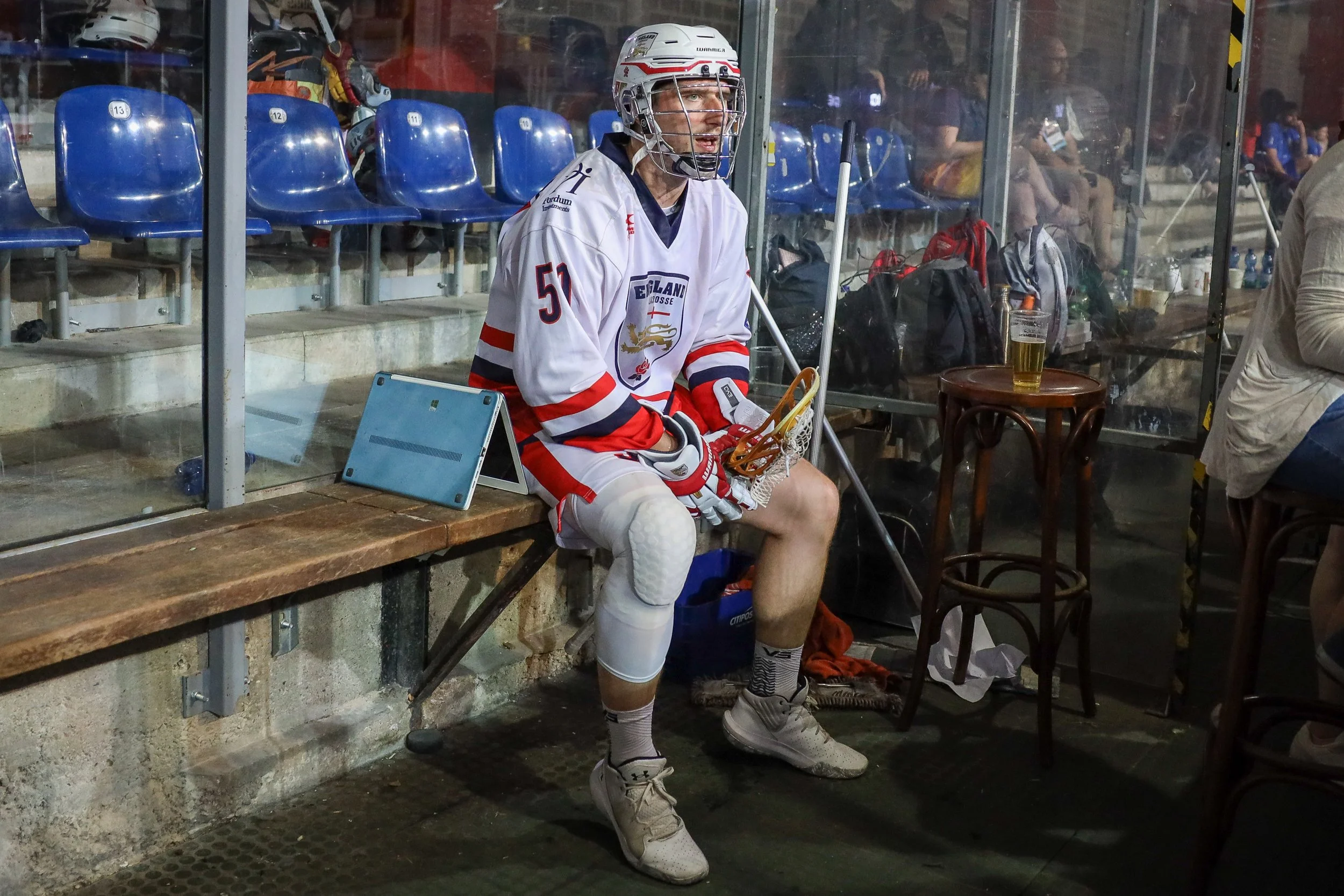 Roche sits on bench on his own after a match at 2022 Euros