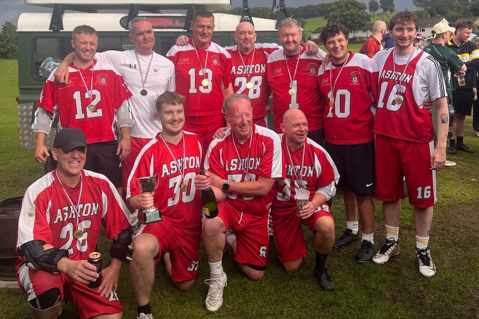 Ashton squad photo with players holding 2026 Border Eights trophy