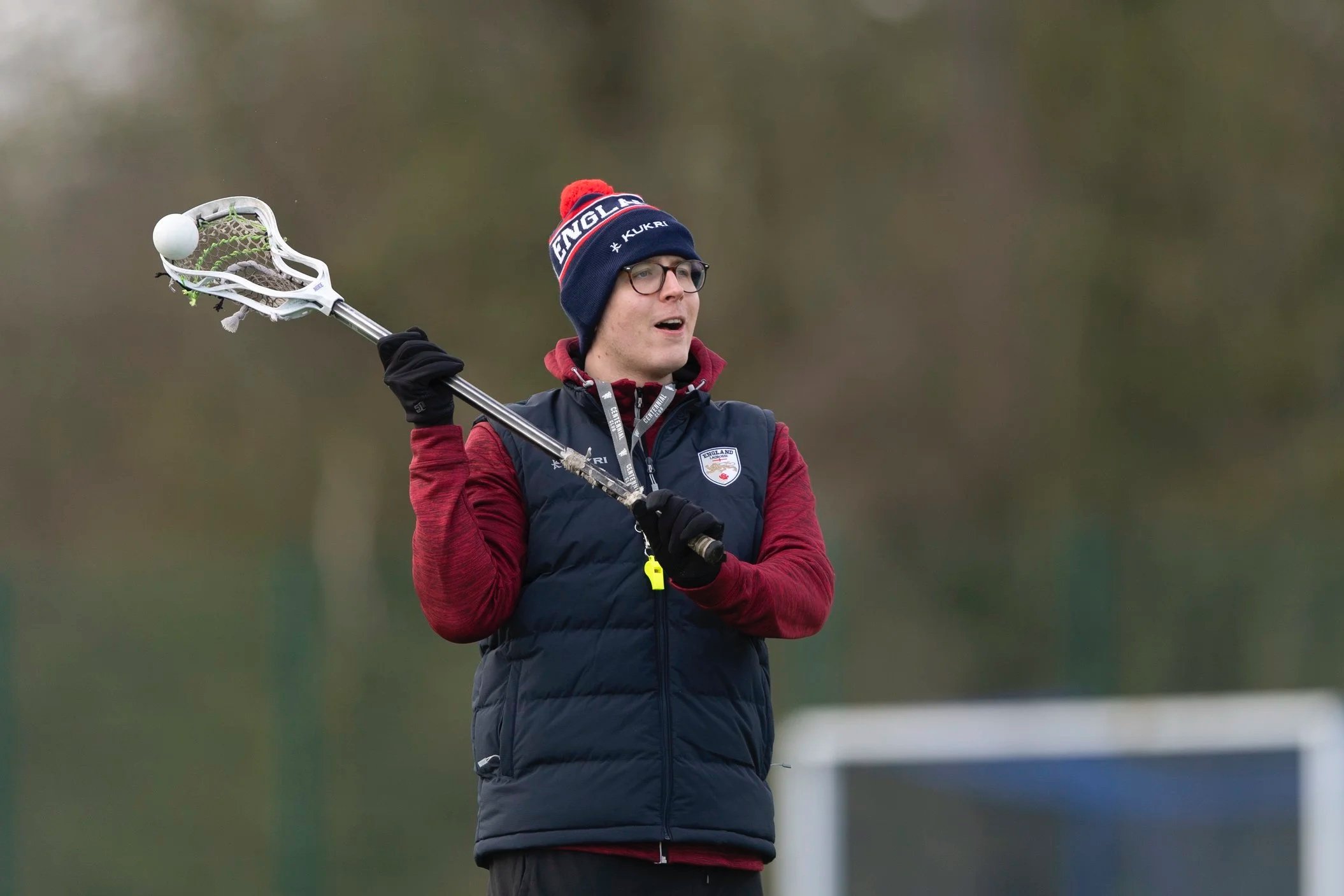 England Lacrosse Aspire Programme coach with ball in stick