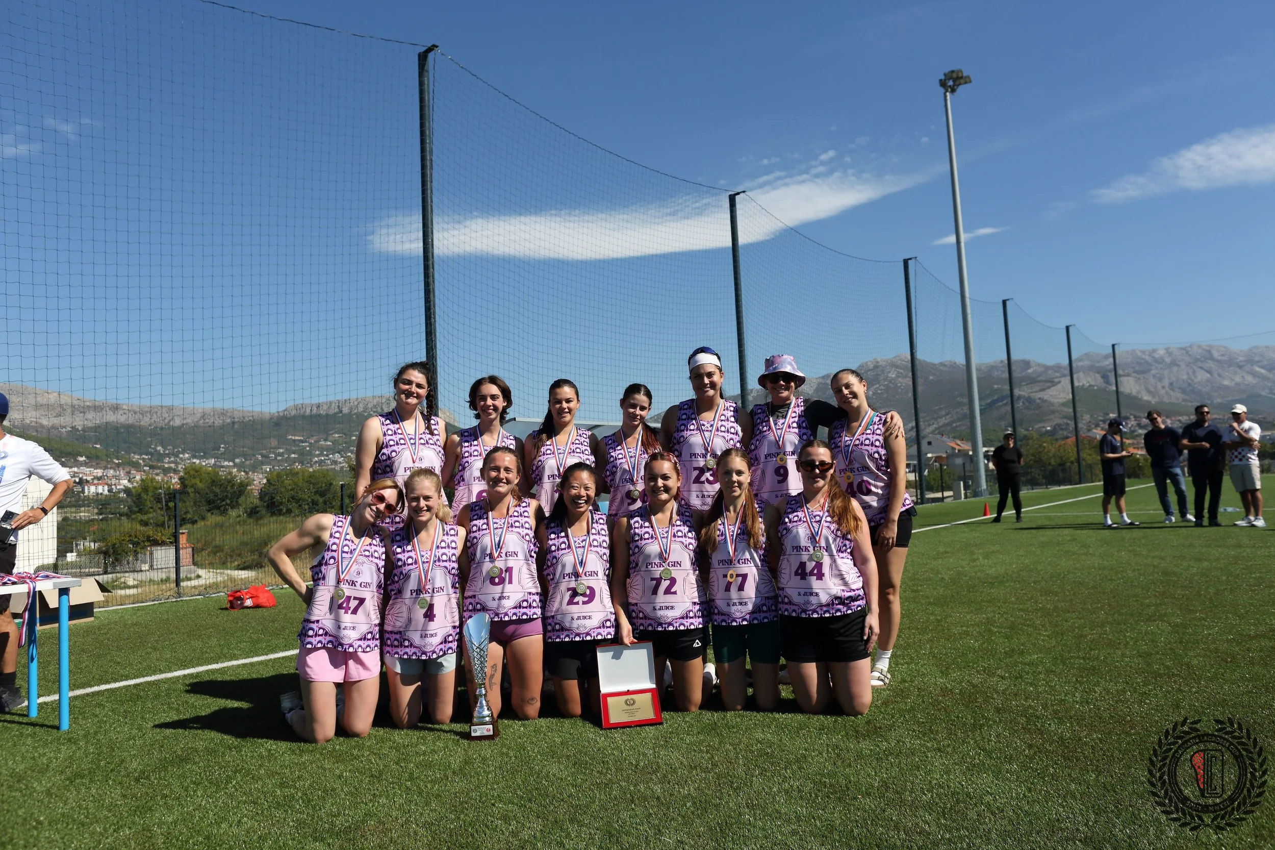 Pink Gin & Juice squad photo with Dalmatia Cup trophy