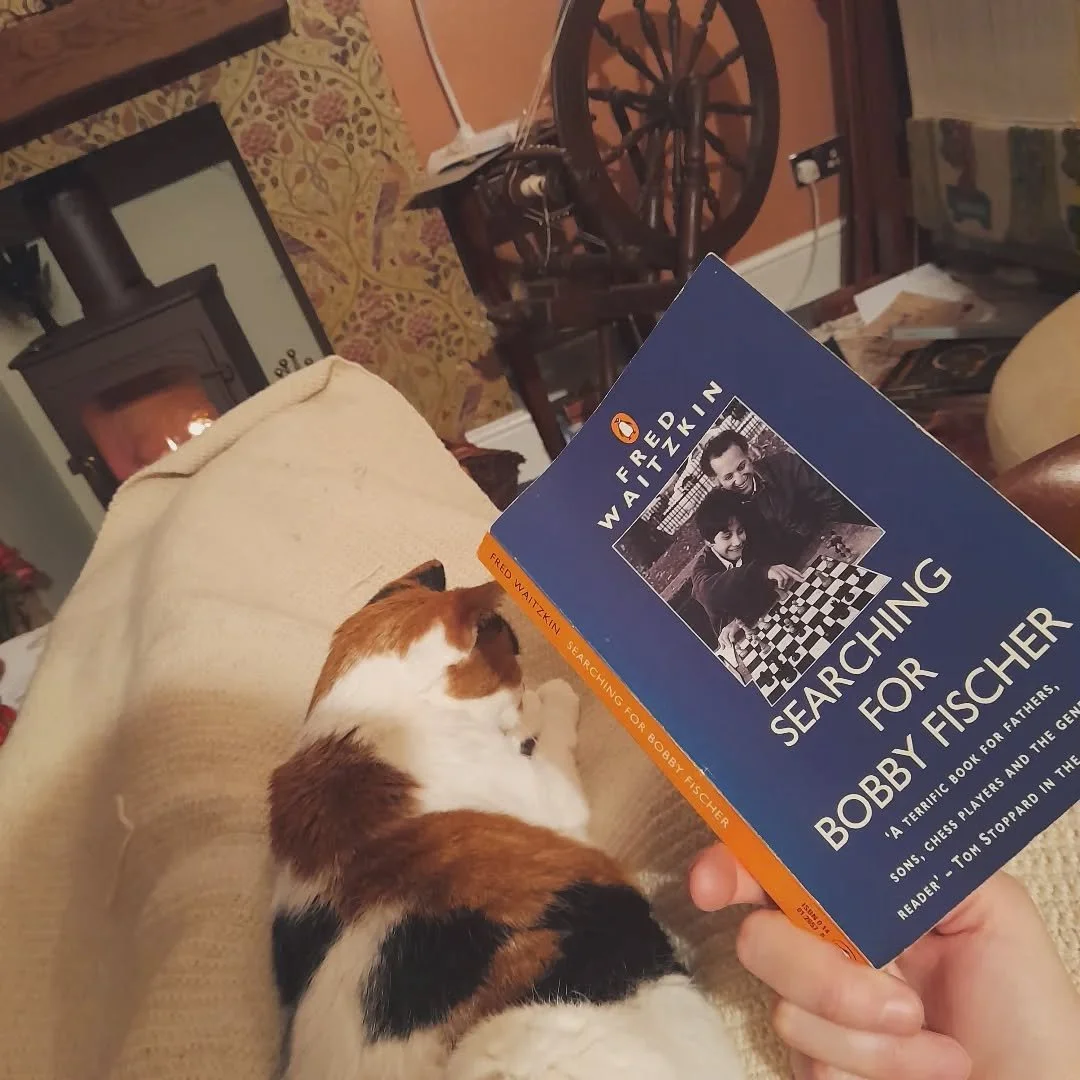 Reading in an organised- ish creative chaos.. that's why Tinkerbell fits in so well . She's the best present I've ever had, gifted to me after treatment when i was 8 🤭🎨💕♟️🧶

#cats #animallovers #book