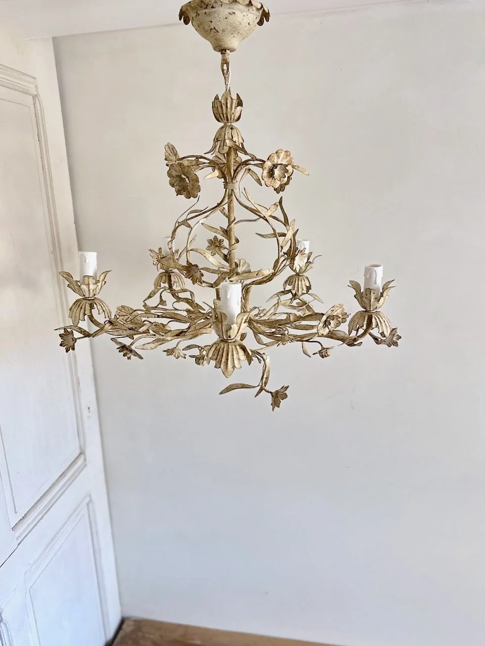 Vintage cream floral tole chandelier with five lights, painted metal flowers and brown antiqued detailing, circa 1960s..jpeg
