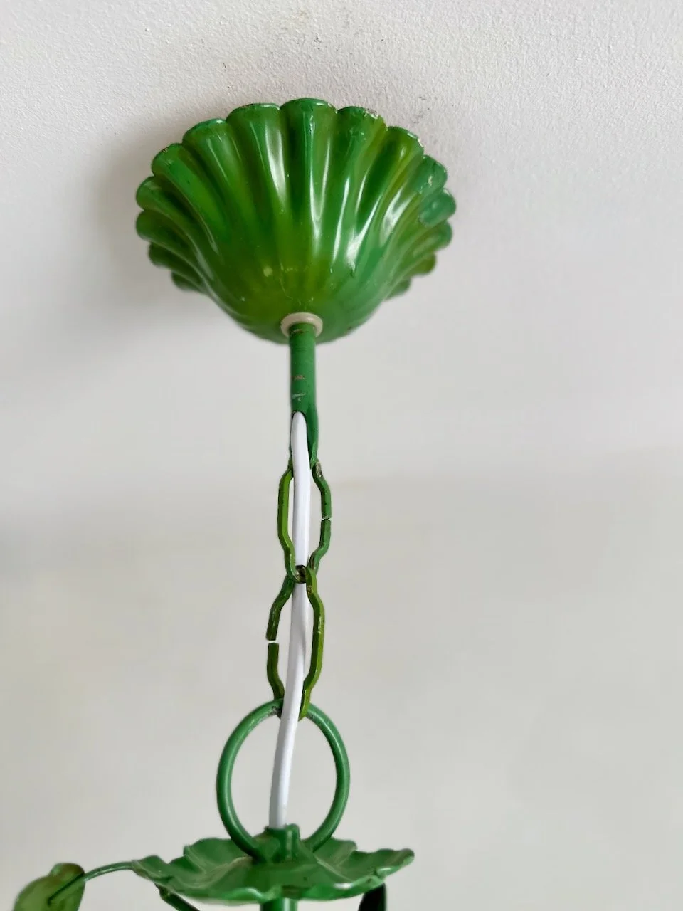 Detail of the original green chain and scalloped painted metal ceiling canopy on the Italian chandelier. IMG_7534.jpeg