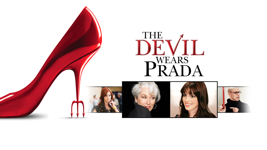 Red high heel shoe with a trident-shaped heel and photos of four people; text reads "The Devil Wears Prada."