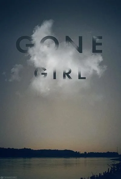 Minimalist "Gone Girl" image with text over a cloudy sky and silhouette of a river or lake.