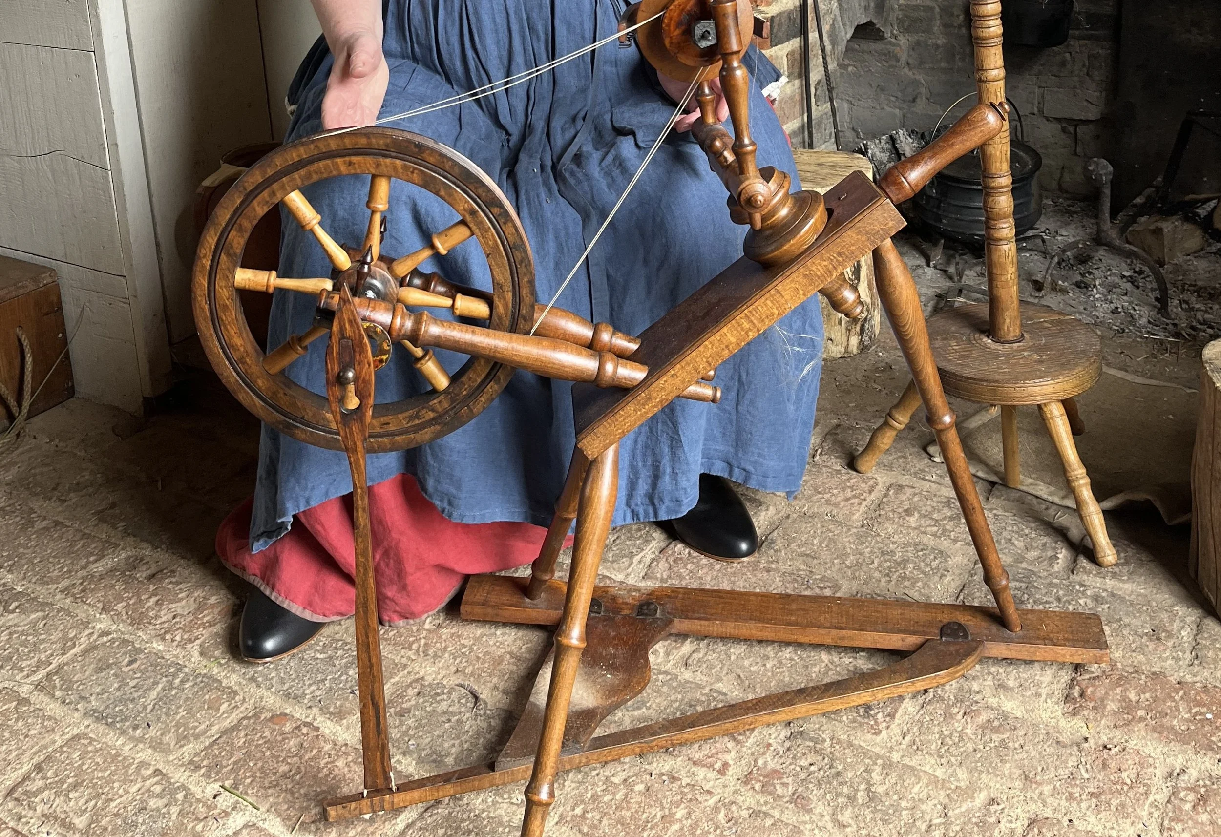 A traditional wooden spinning wheel