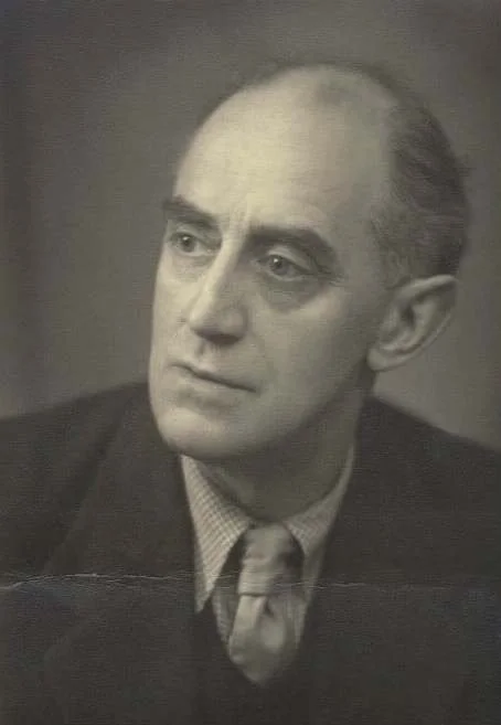 A photograph of artist John Nash