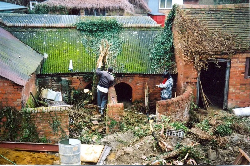 brick pigsties being dismantled
