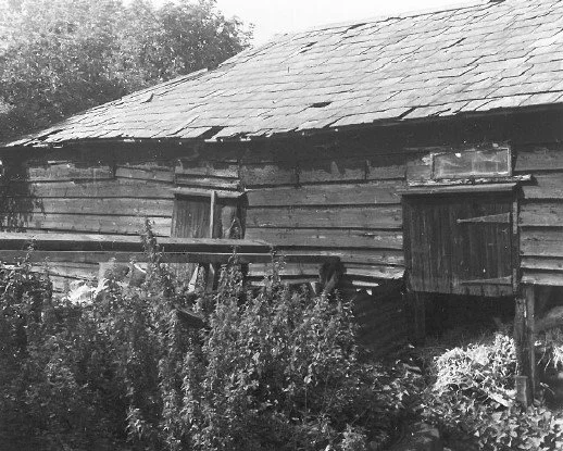 Exterior of overgrown cattle byre