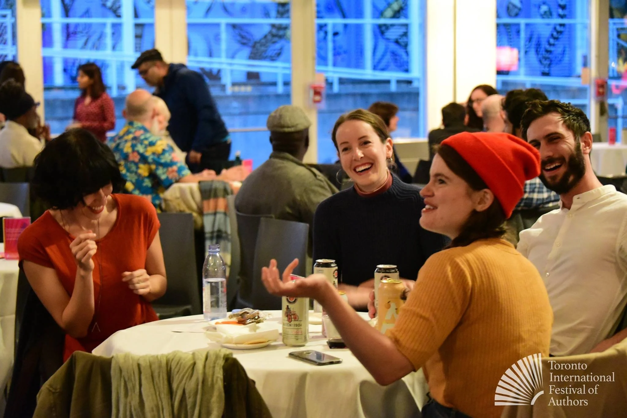 Robin Richardson (far left), Michelle Brown (right) and Dominique Bernier-Cormier (far right) having a laugh with fellow Toronto Lit Up: Launch of Launches guests. They both launched their books, Sit How You Want and The Correspondent, through Toront