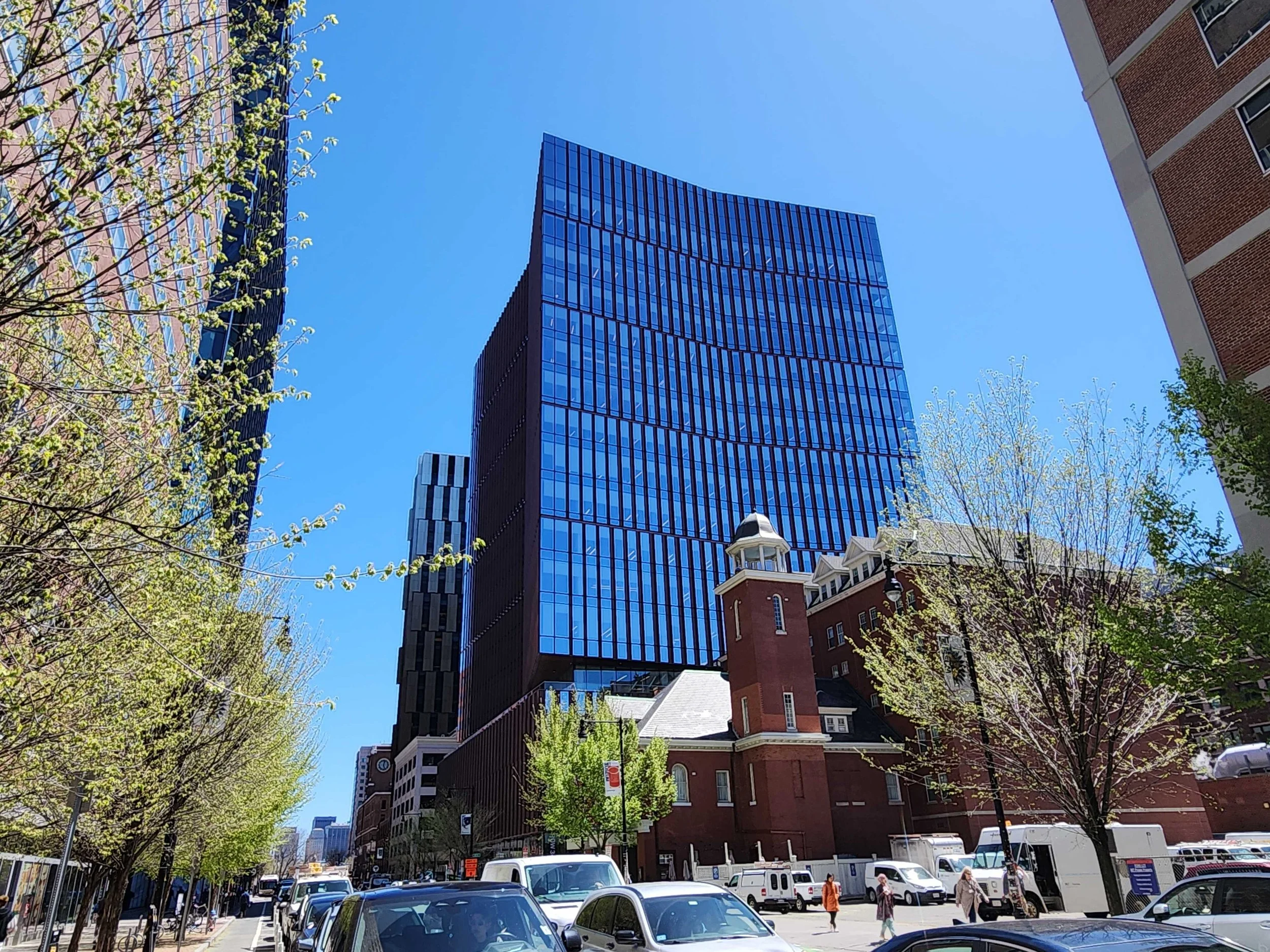 Glass-fronted building housing the MIT-IBM Computing Research Lab in Cambridge, Massachusetts