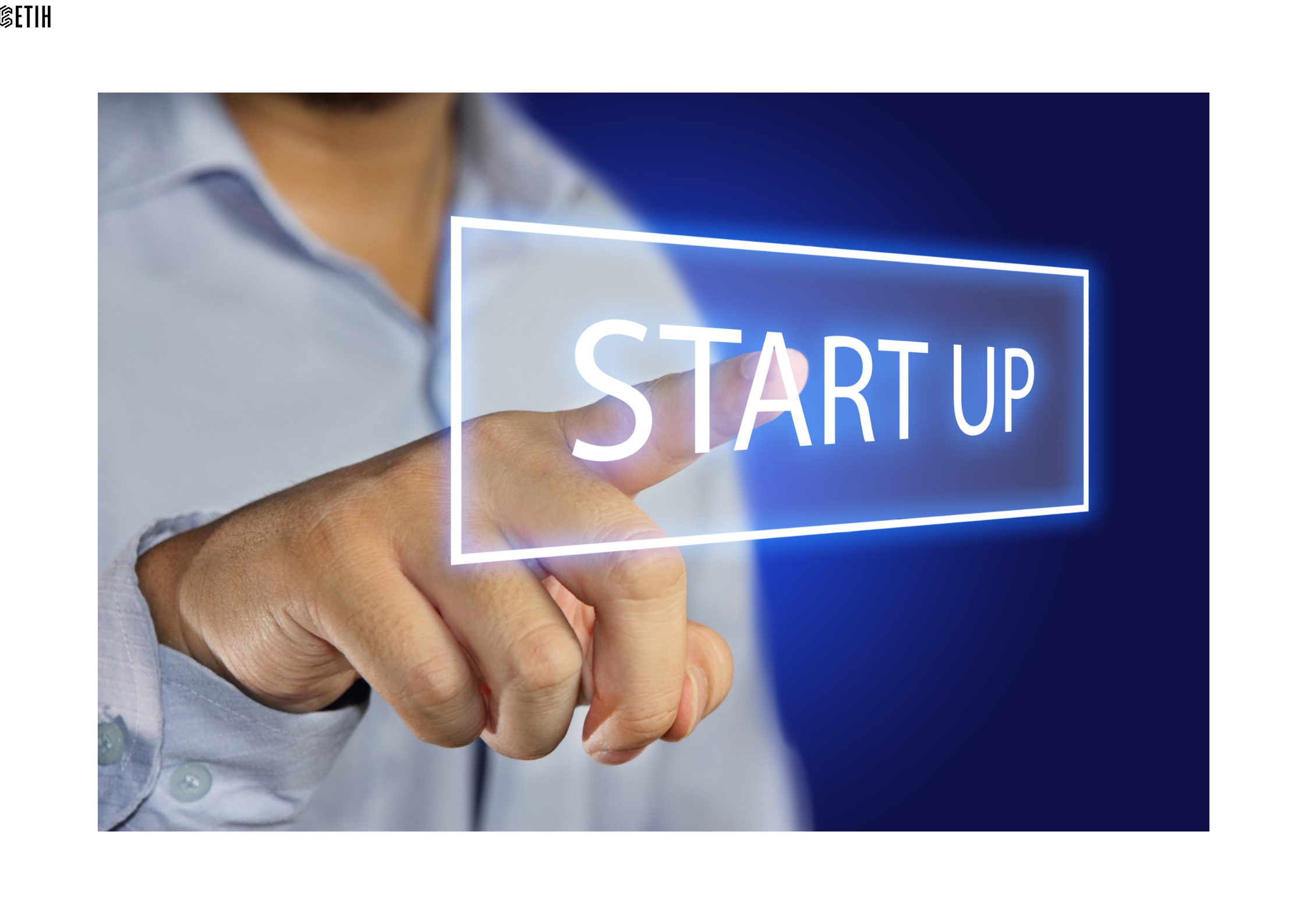Pictured is a finger pointing to a lit up 'Start Up' sign