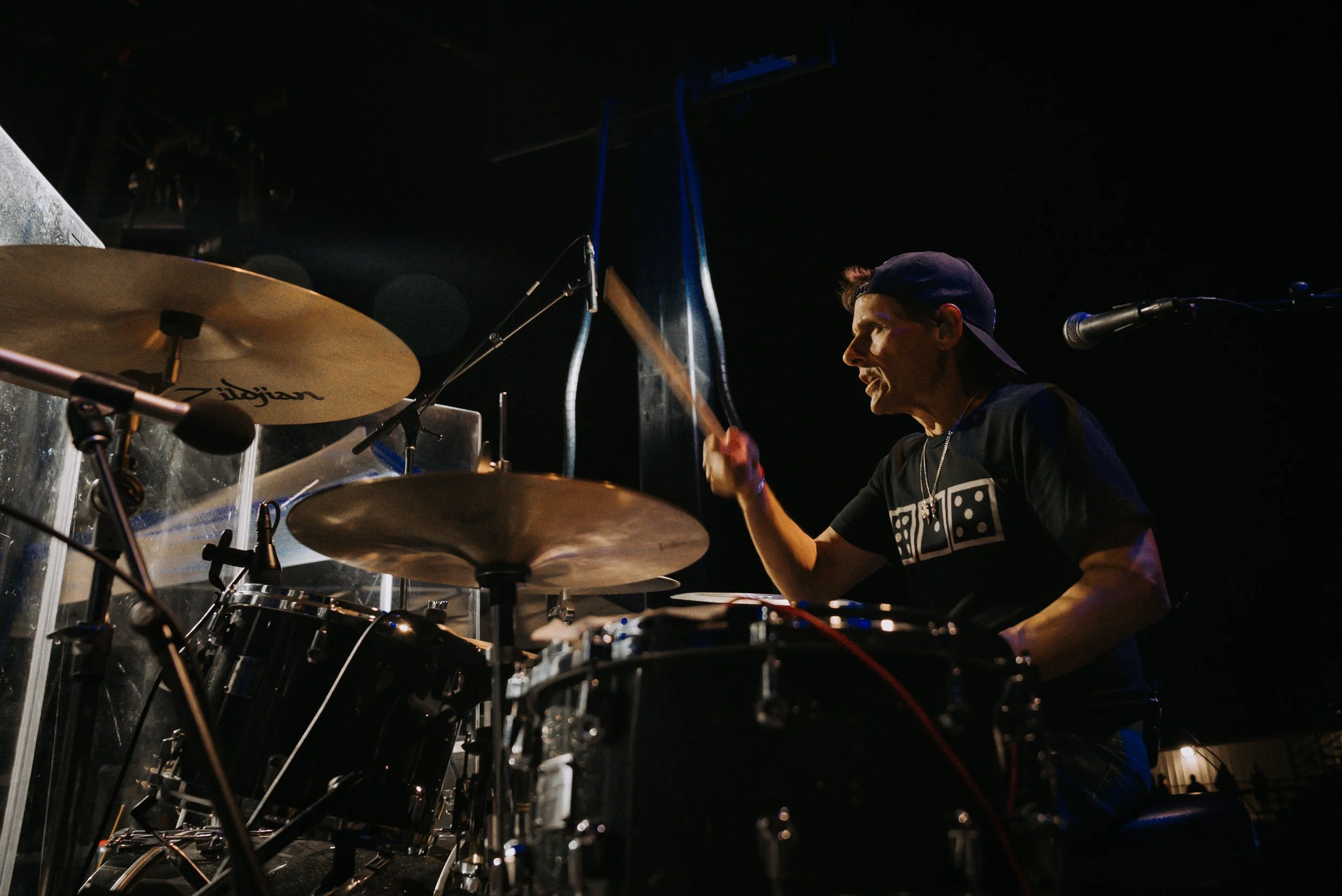 Rodney Atkins Drummer Kevin Rapillo playing drums on stage at Summit County Fairgrounds in Coalville, Utah.