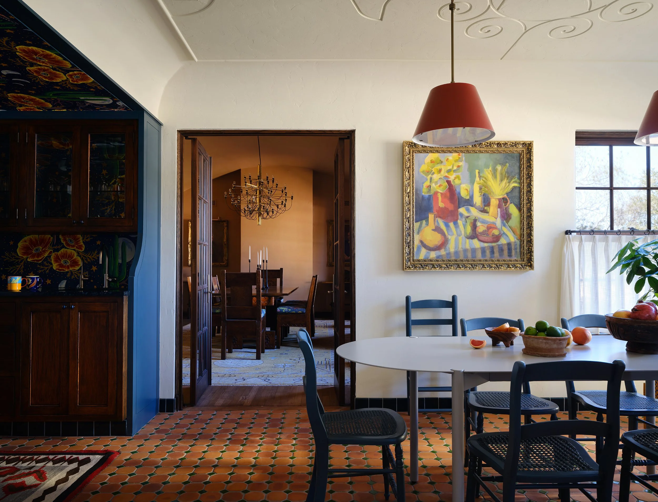 15_Texas Ranch House_Cuppett Kilpatrick Architecture and Interior Design_Austin Texas_spanish-mexican-colonial-saltillo-floor-plaster-ceiling-motif-wild-wallpaper-bulter-pantry.jpg