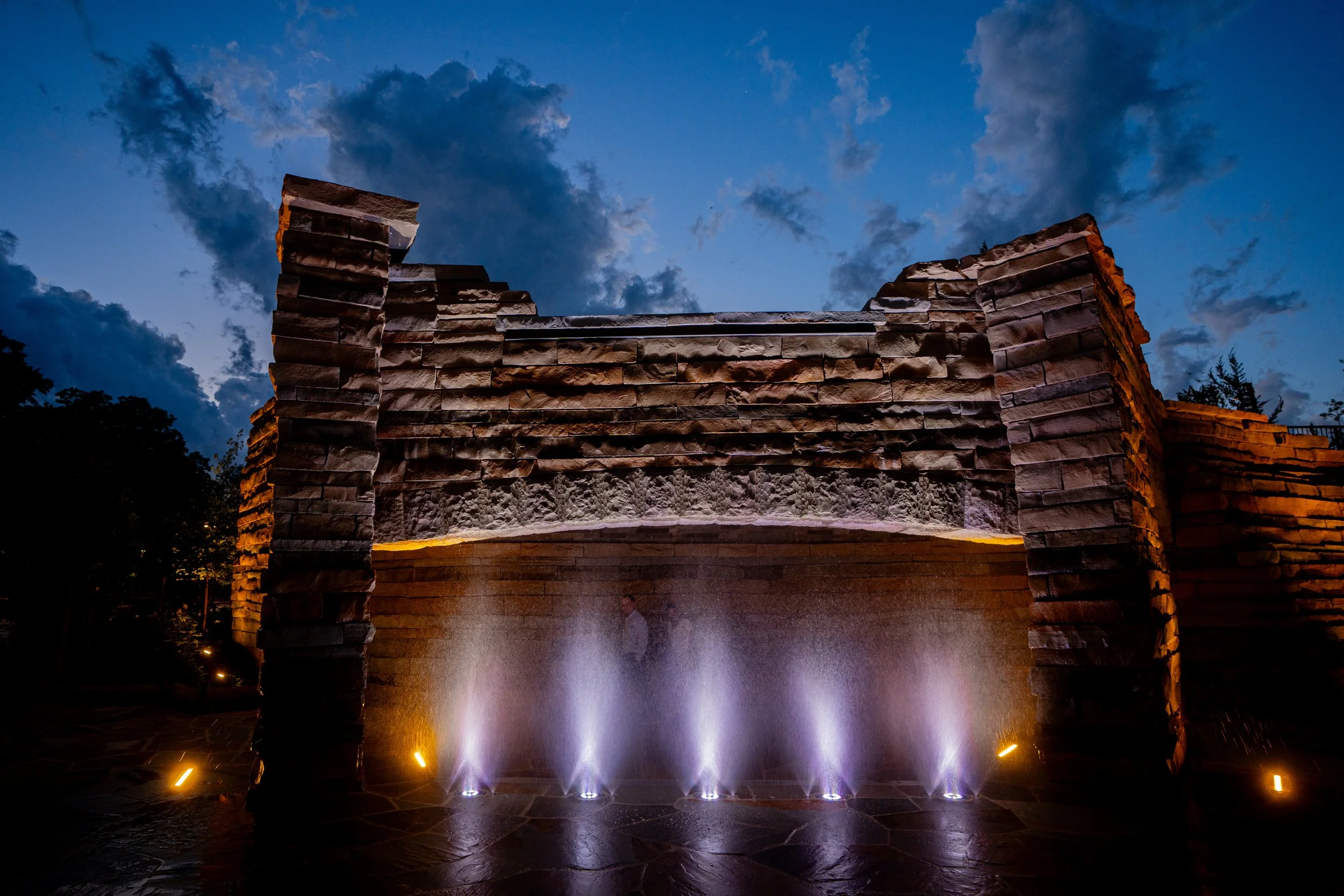 Fountain Plaza Waterfall at Gipson Play Plaza at Night