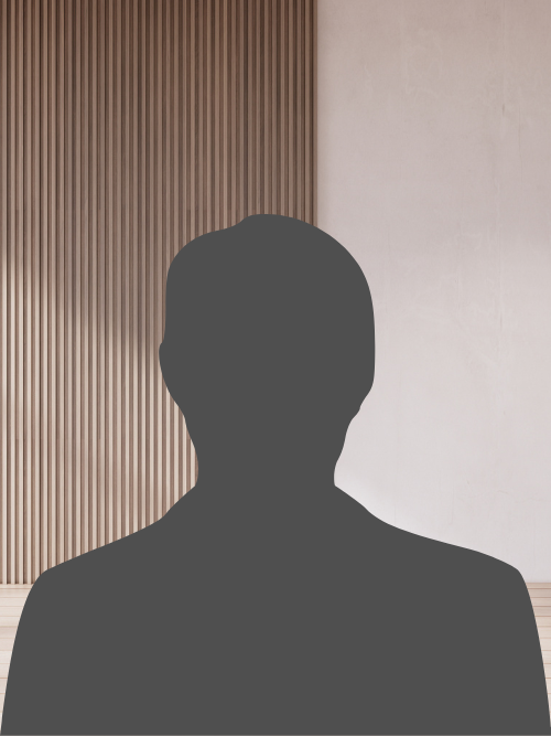 Silhouette of a person in front of a modern interior wall with wooden and concrete panels.