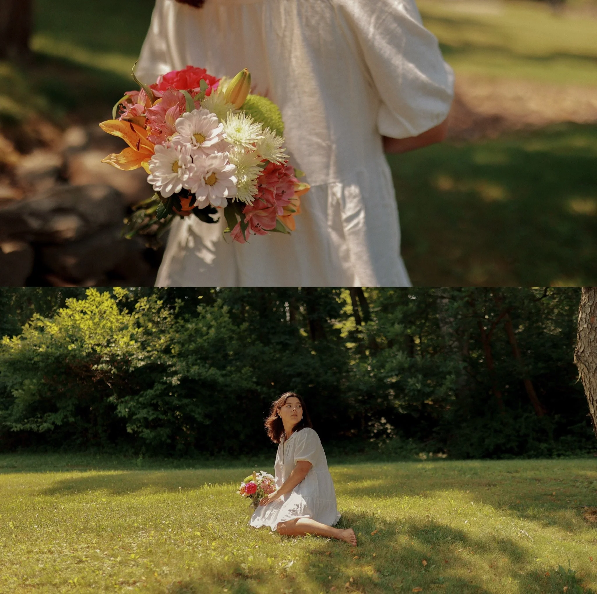 A young woman in a white dress is sitting on grass in a park, holding a bouquet of flowers, with trees and sunlight in the background.
