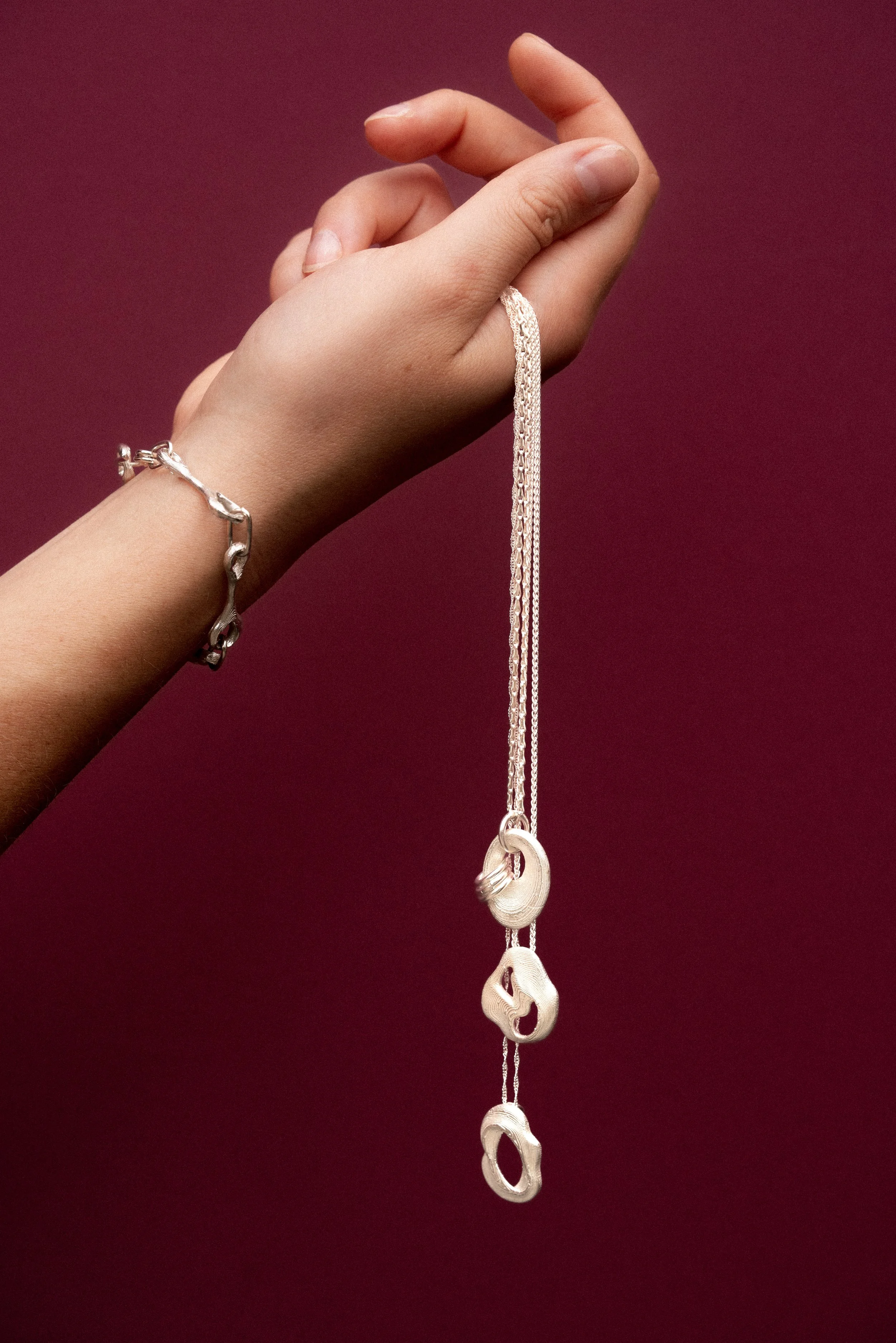 StudioAgaea_Os Bracelet_Oracle_3 pendnats.jpg