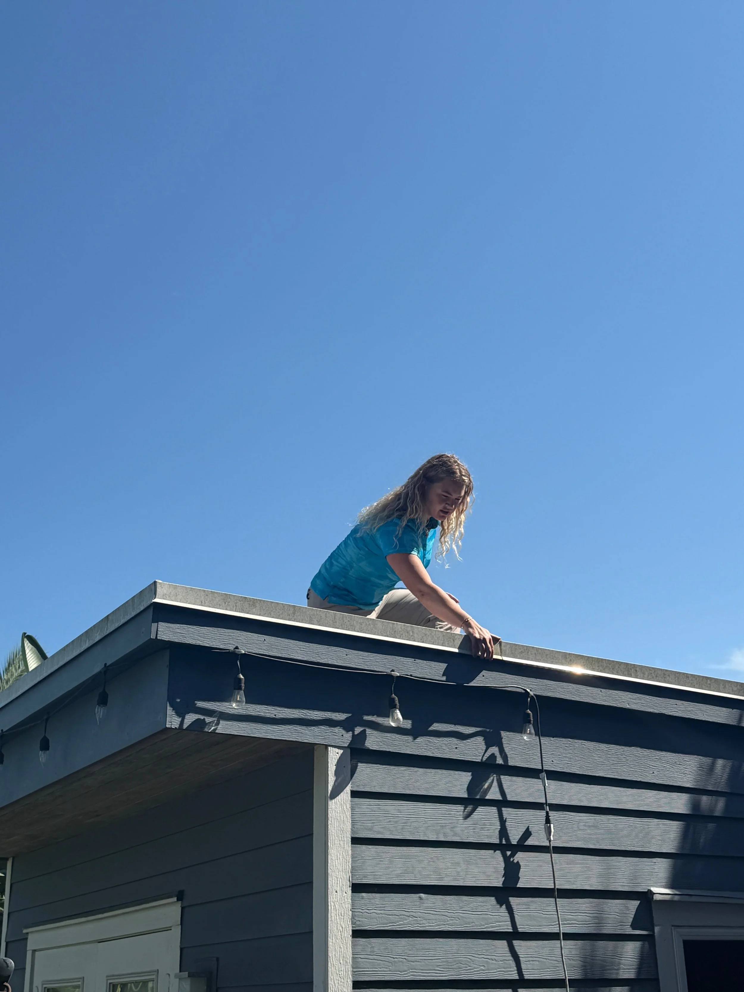 Tori Andrews completing a home inspection.JPG