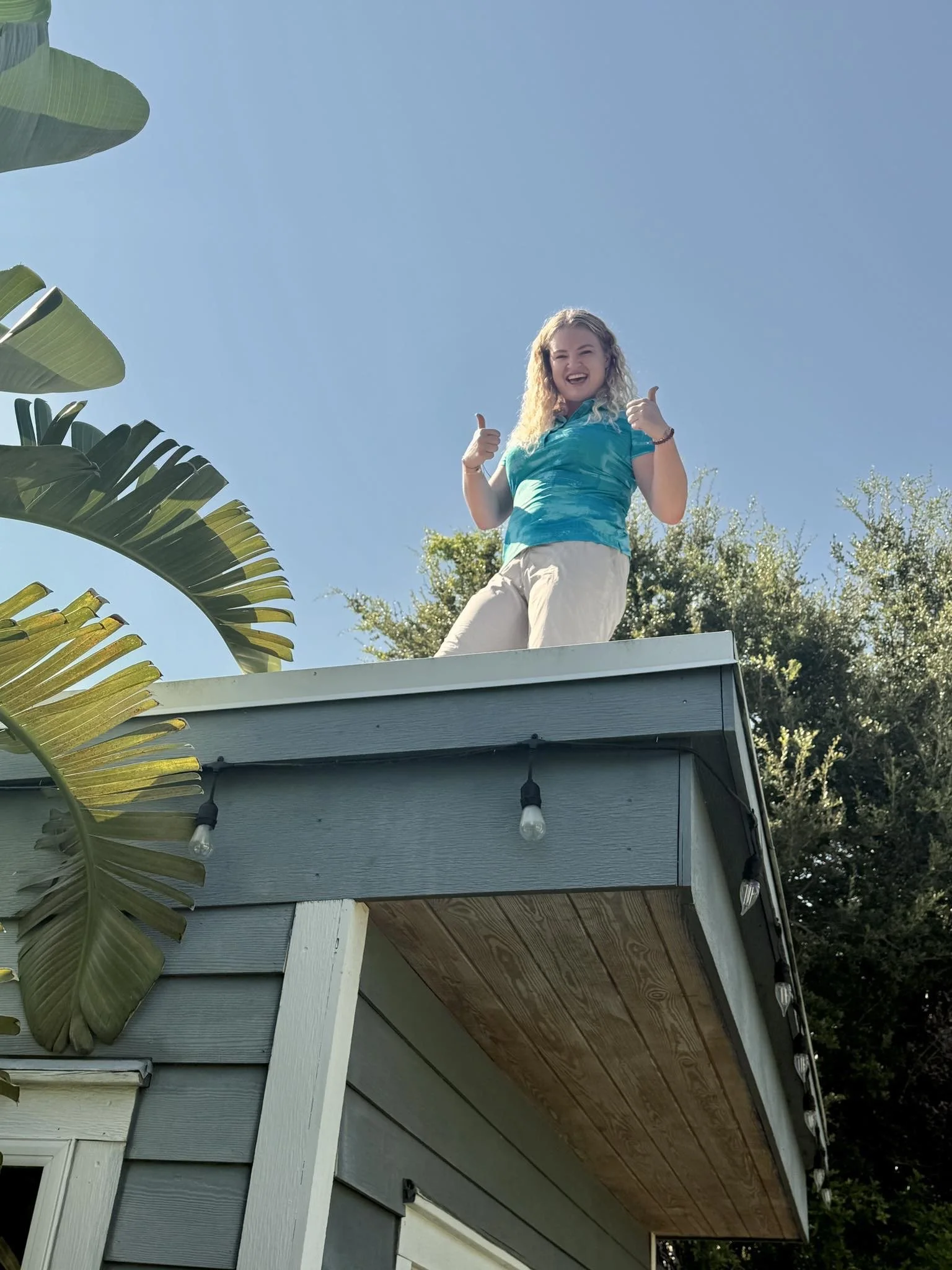 Tori Andrews Inspecting a Roof.jpg