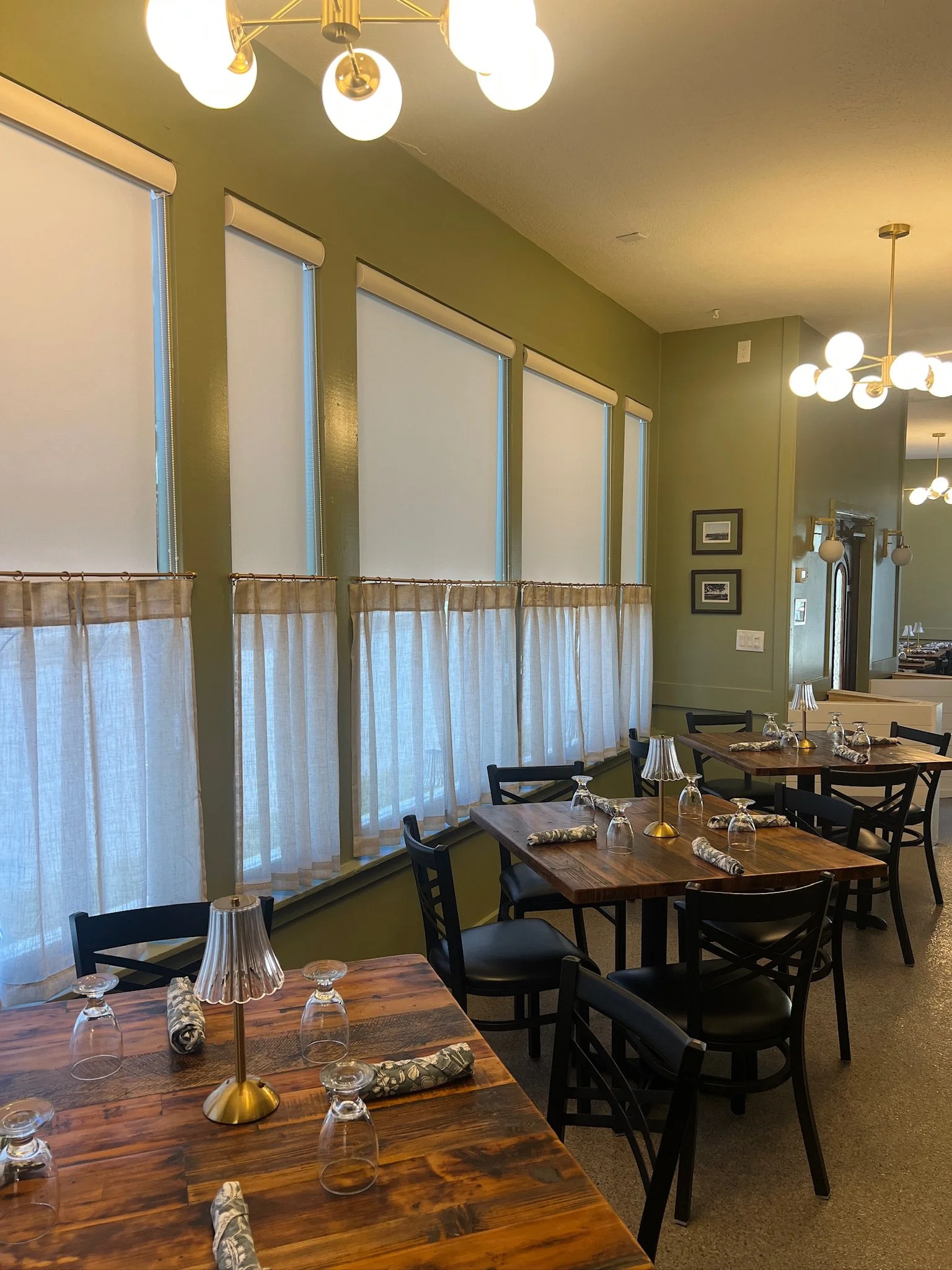 Refreshed dining room at the new Purple Olive location.JPG