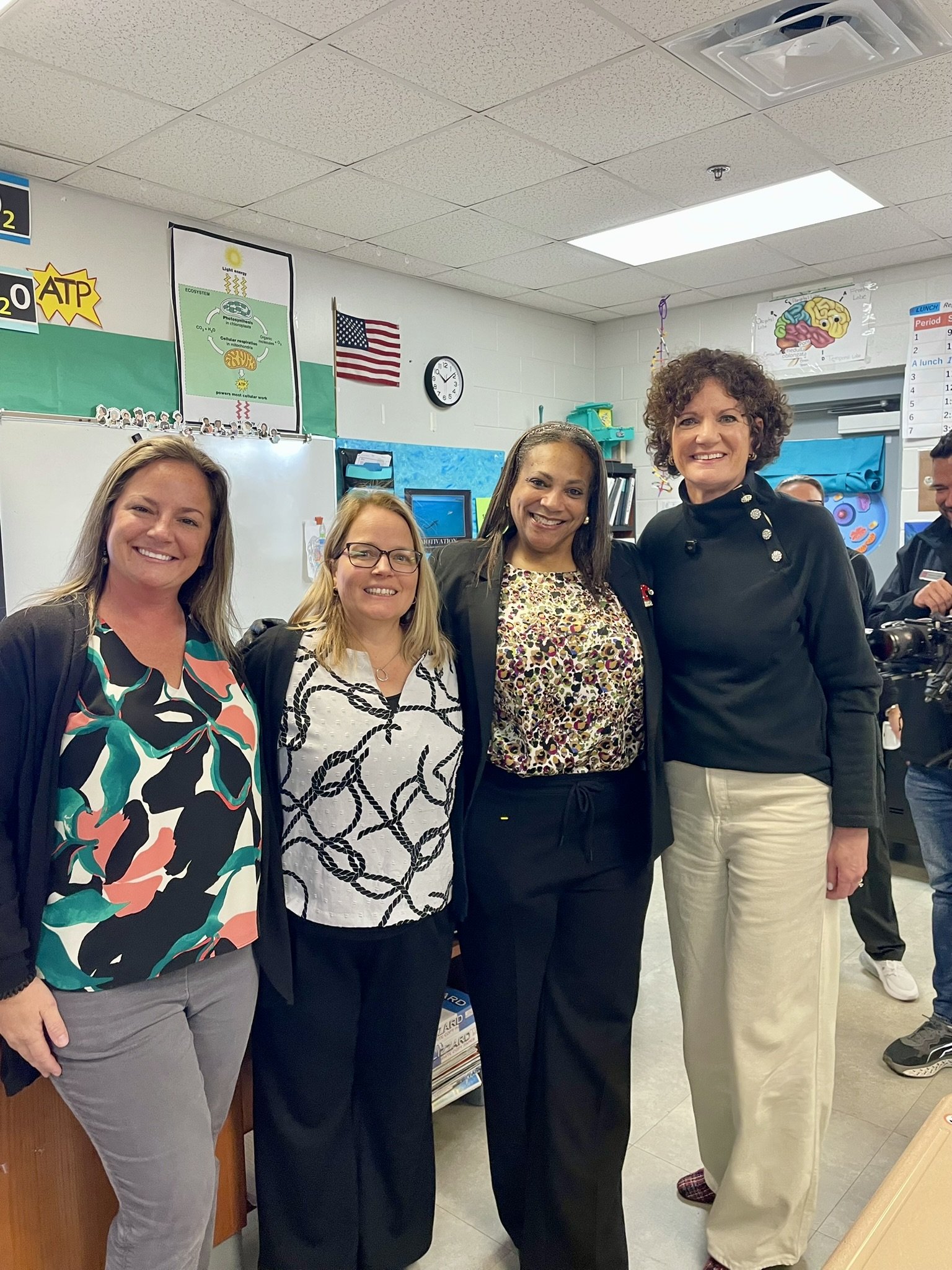 Previous St. Johns County District Teachers of the Year surprise Teacher fo the Year Finalist Denise Shedlock. Left to Right Tracy Clauson, Denise Shedlock, Tina Hemby, and Jill Adams.JPEG