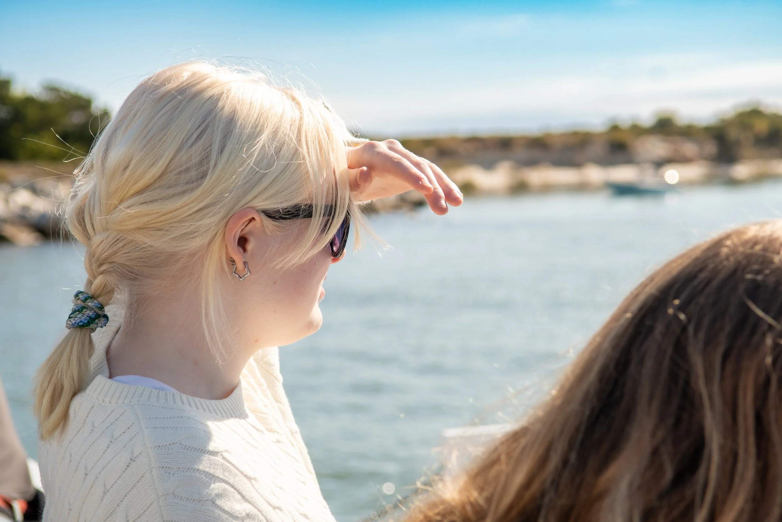 Passenger looking for dolphins photo credit Justin Snavely.jpg