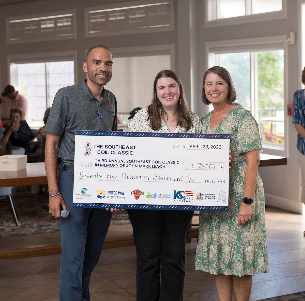 Viv Helwig with members of John Mark Leach's family photo credit Monarch Studio.png