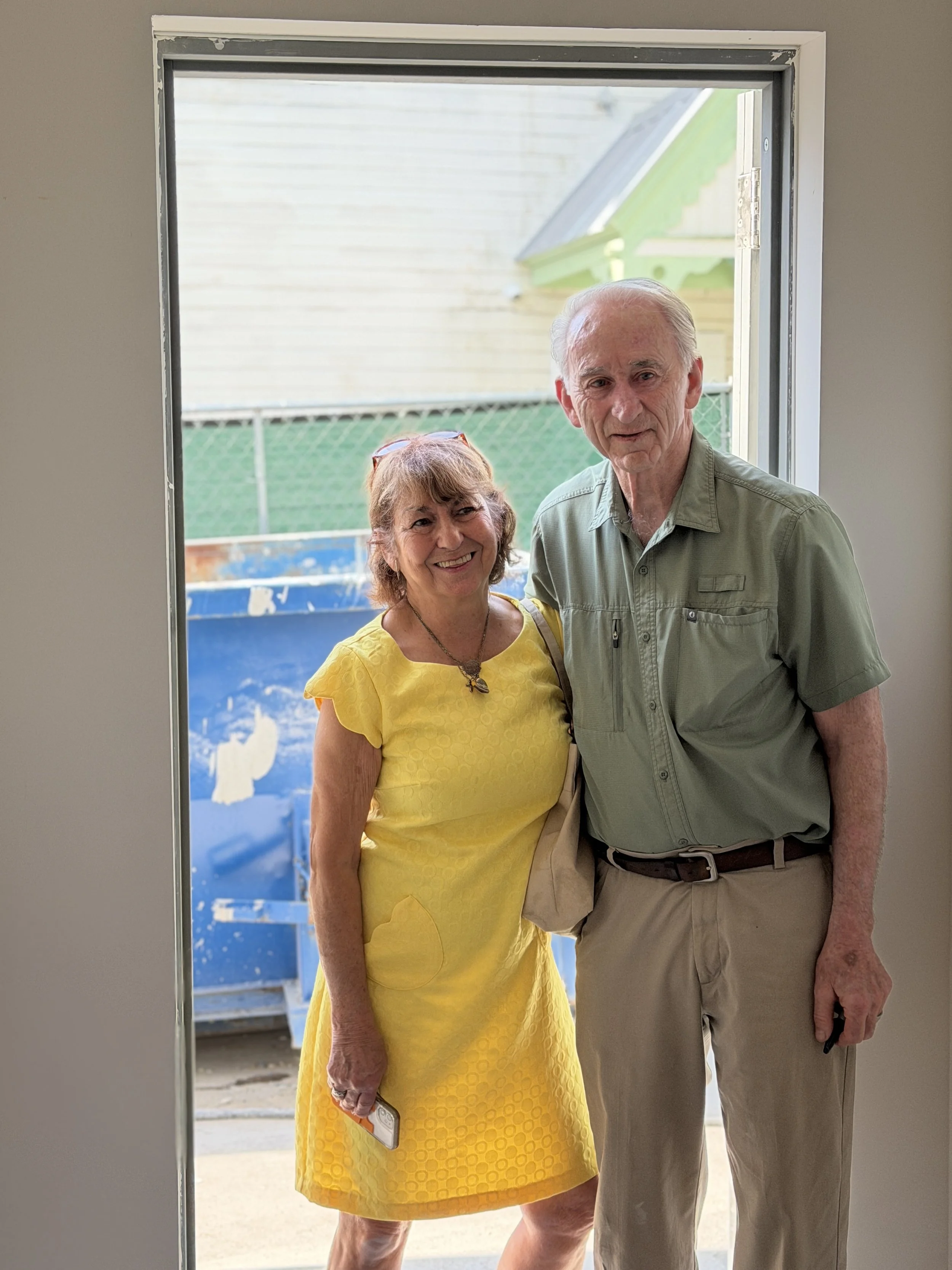 Fran and Bob Goff in the entry of the Goff Family Shelter photo by St. Augustine Society.jpg