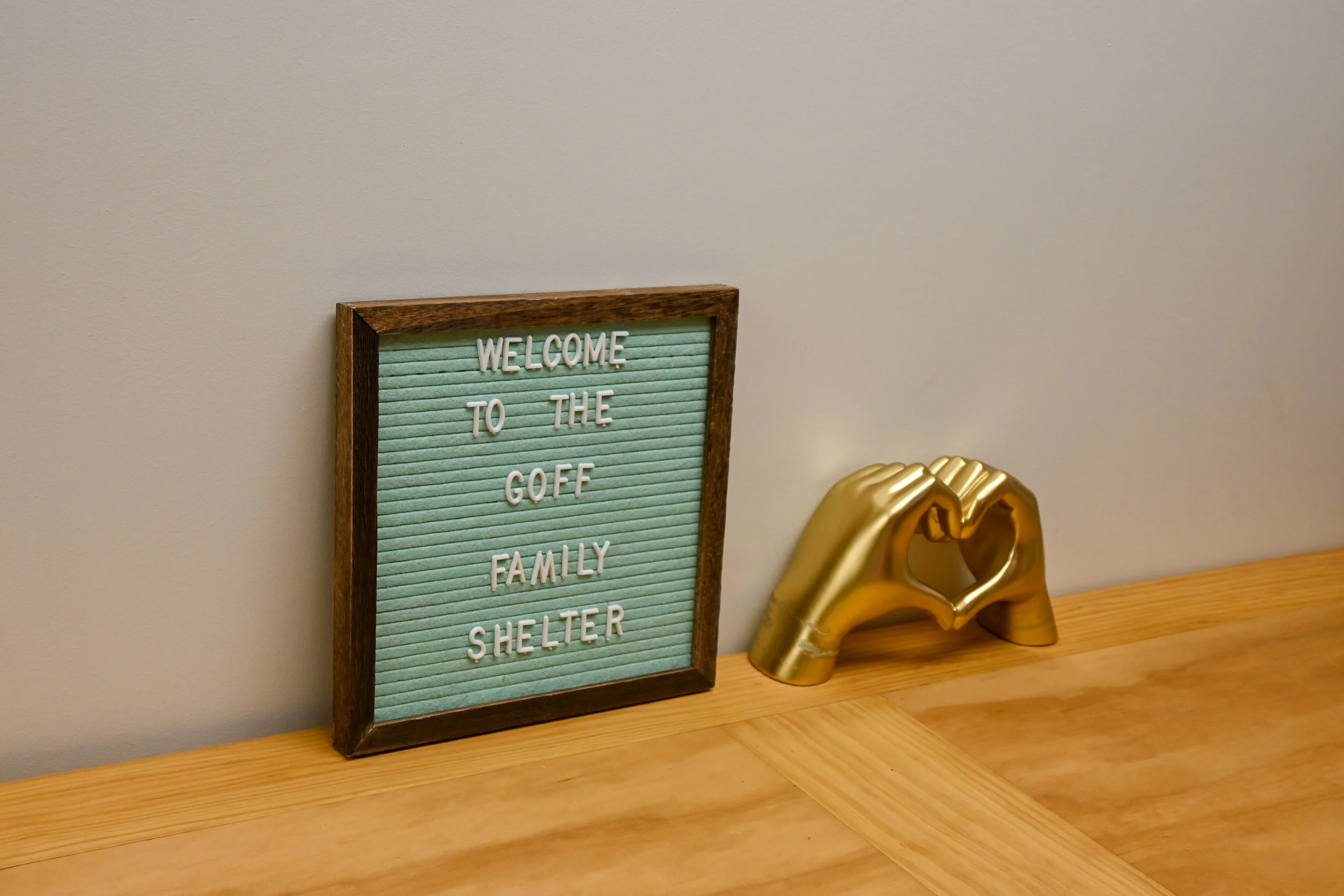 Welcome sign in kitchen photo by St. Augustine Society.jpg