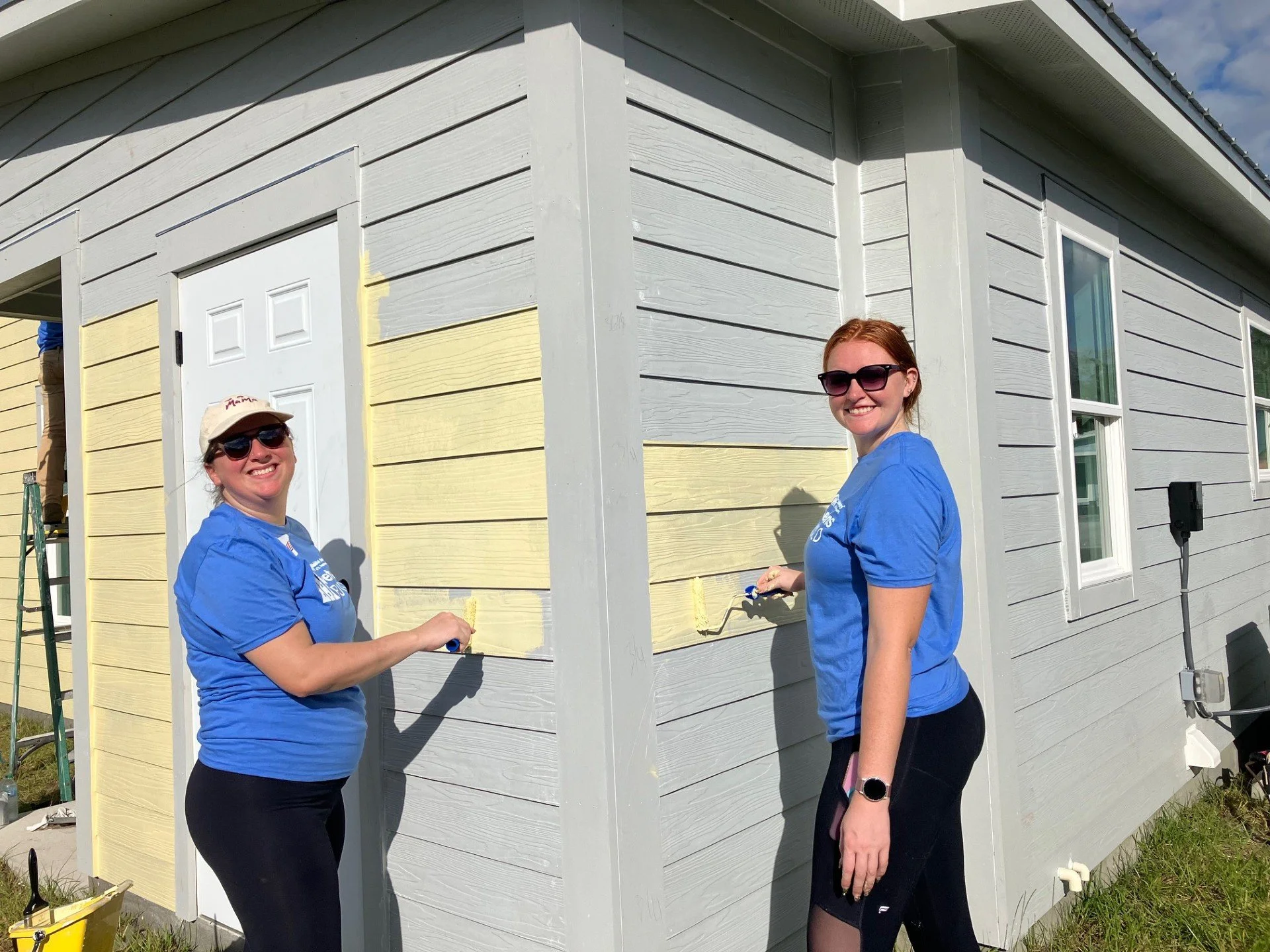 Volunteers painting at Habitat St. Johns 2025 Veterans Build photo credit Habitat for Humanity of St. Johns County.jpg
