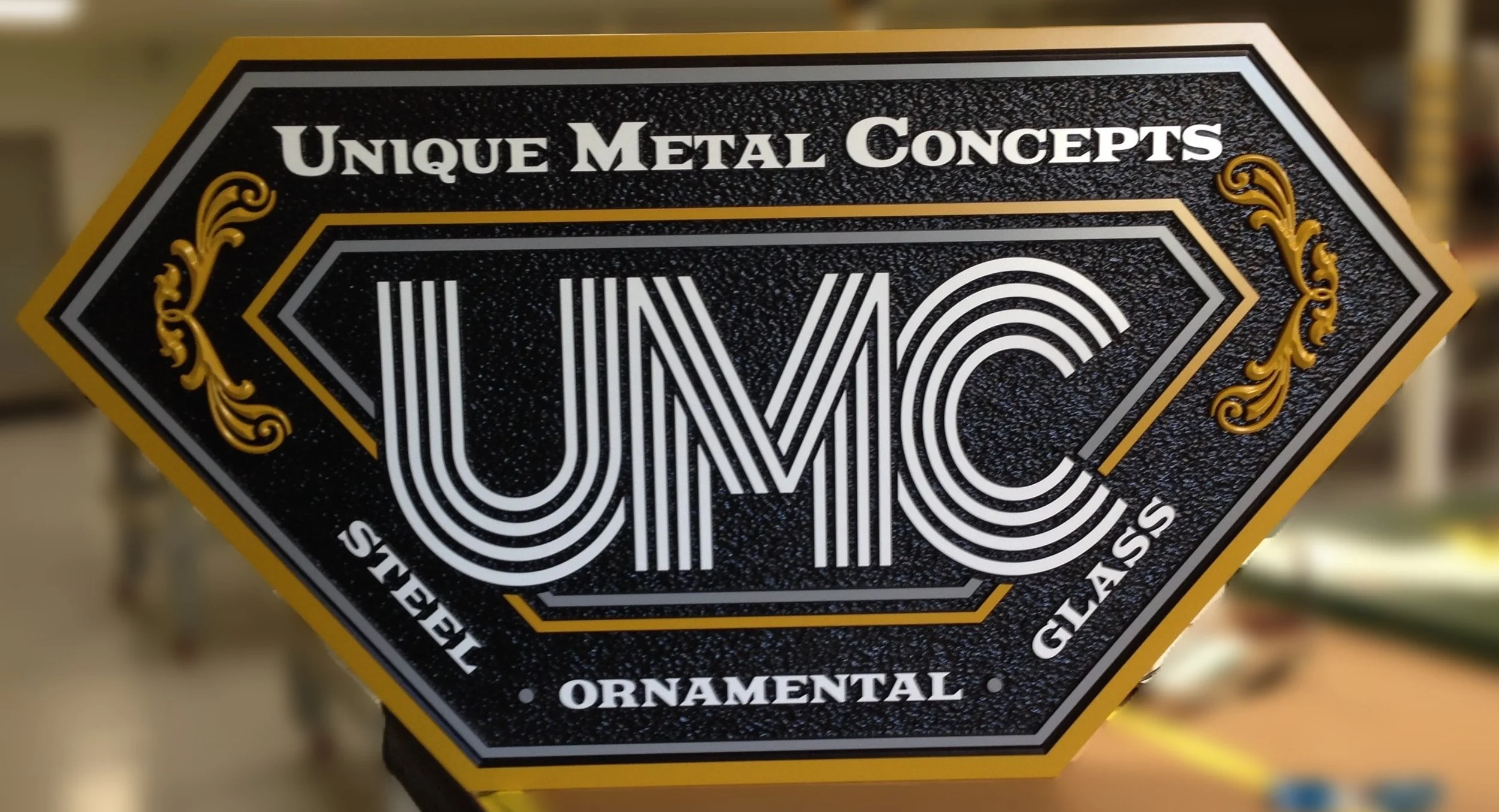 Unique Metal Concepts blurred background.JPG