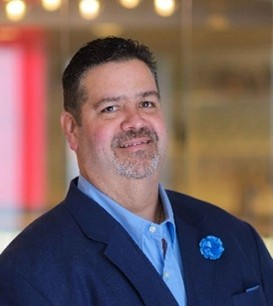 Enrique (Kiko) Ferreiro in navy blazer and blue shirt