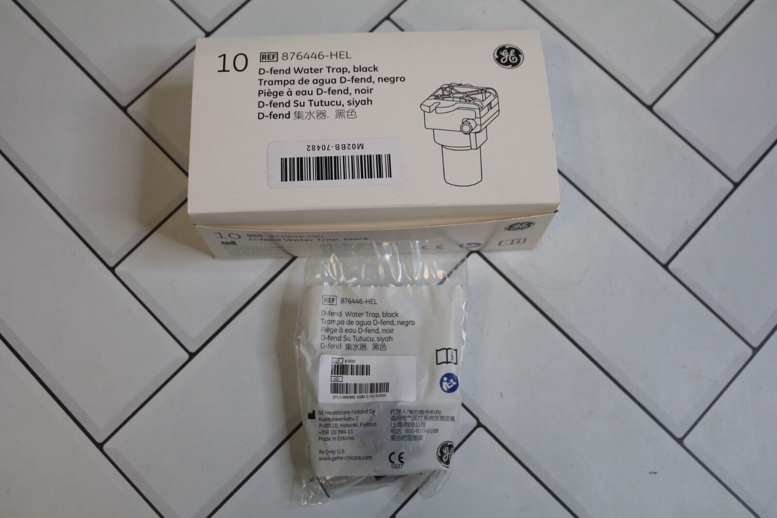 GE | 876446-HEL | NO DATE | BOX OF 10 | D-fend Water Trap Black NON-STERILE