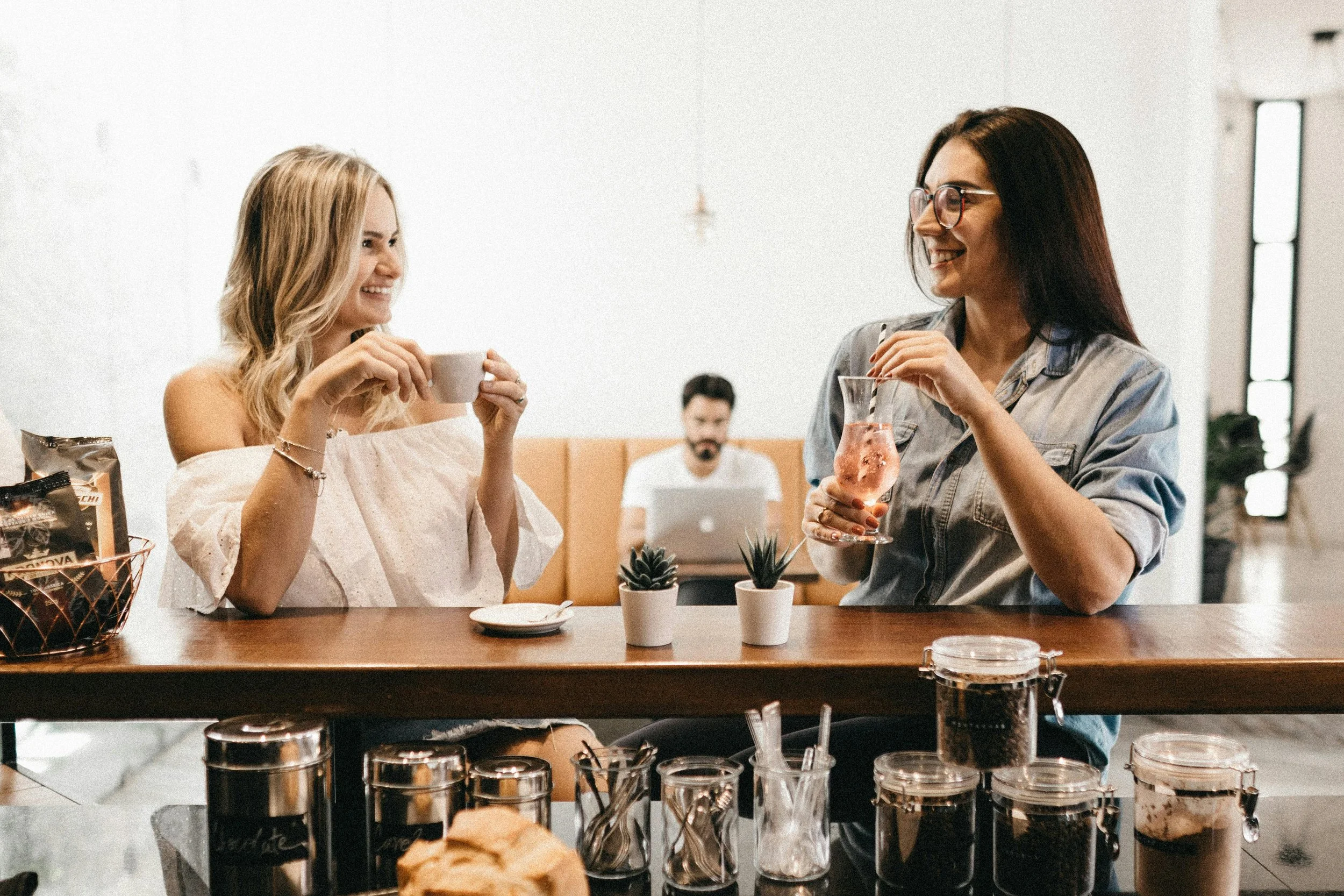 Calm and confident person setting boundaries during a friendly conversation, symbolising self-care and the power of saying no without guilt.