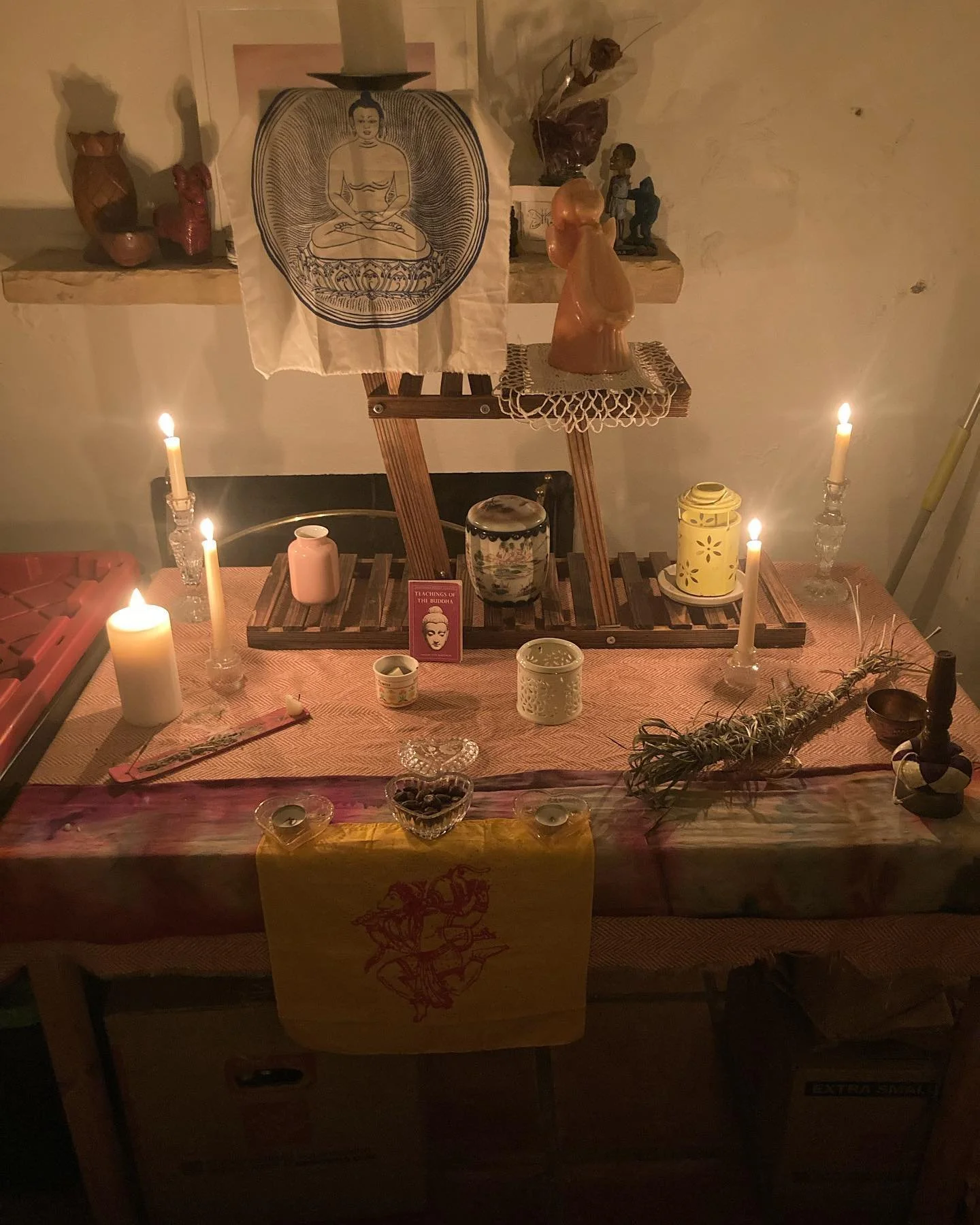 a good friend and dharma brother with whom I often sit curated this incredible vibrant altar in his space. i love practicing in the glow of all these candles and in the presence  of so many unique and (to me at least) very dynamic, alive-feeling arti