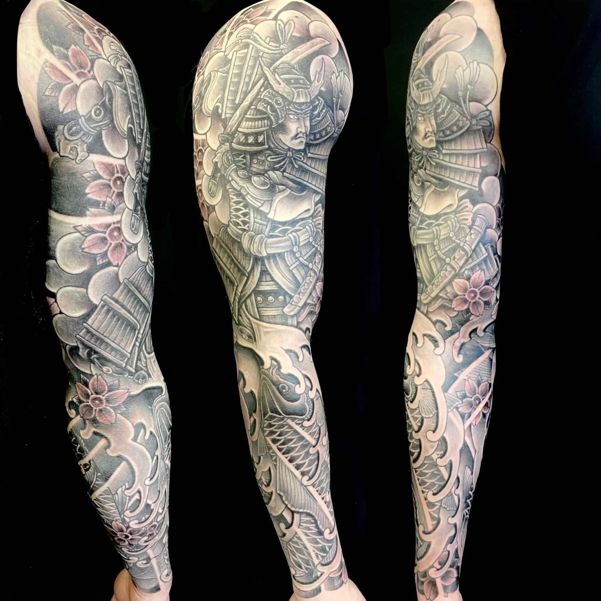 Japanese tattoo sleeve with a samurai and koi.  Water and wind create a flowing background.  Created by artist Cohen Floch in VIcotoria, BC
