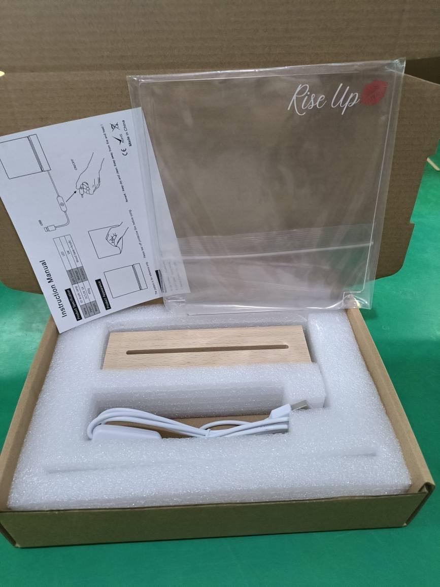Rise Up & Write Light π packaged in its box